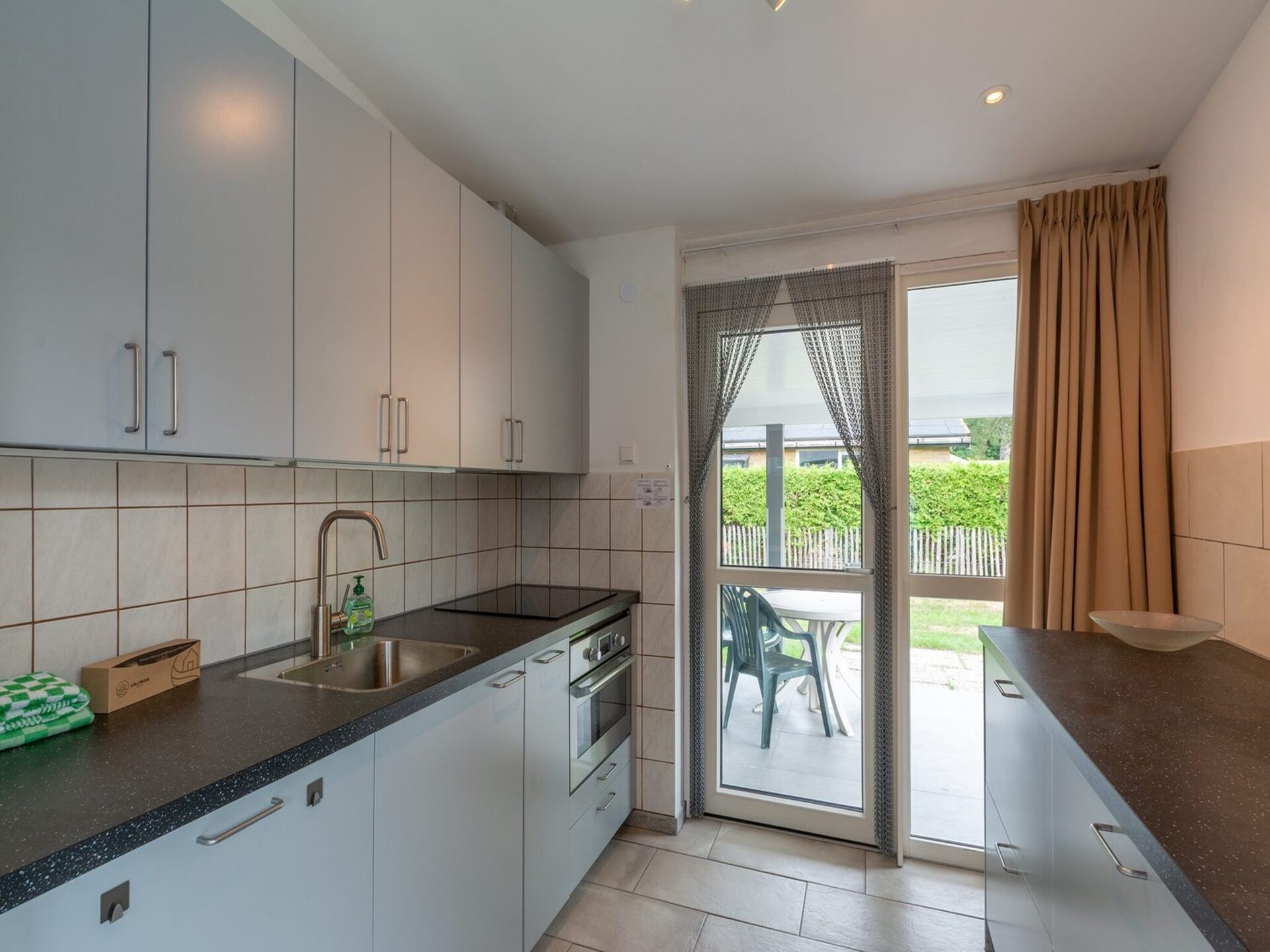 Vrijstaande bungalow met grote tuin op 1,6 km van strand Sint Maartenszee - foto 5