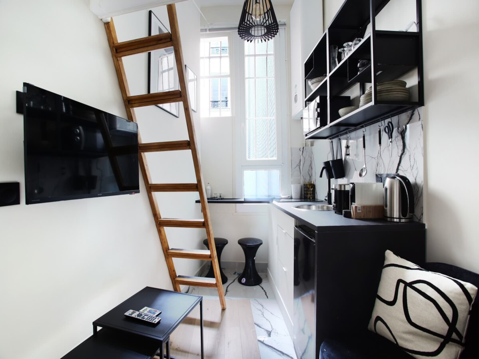 Charmante studio met mezzanine aan de Grands Boulevards in Parijs - foto 2