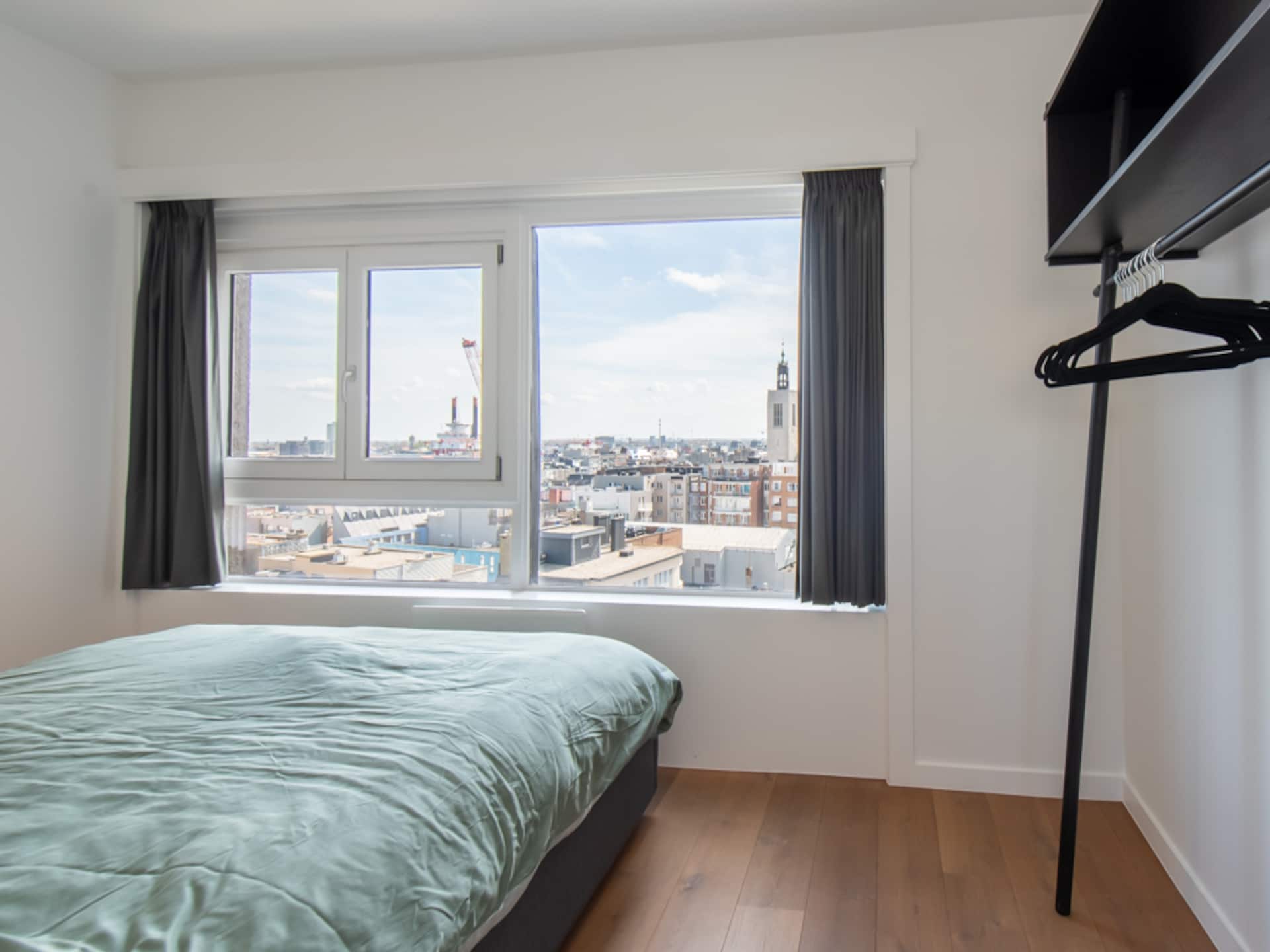 Modern appartement in Oostende met terras en zeezicht - foto 10
