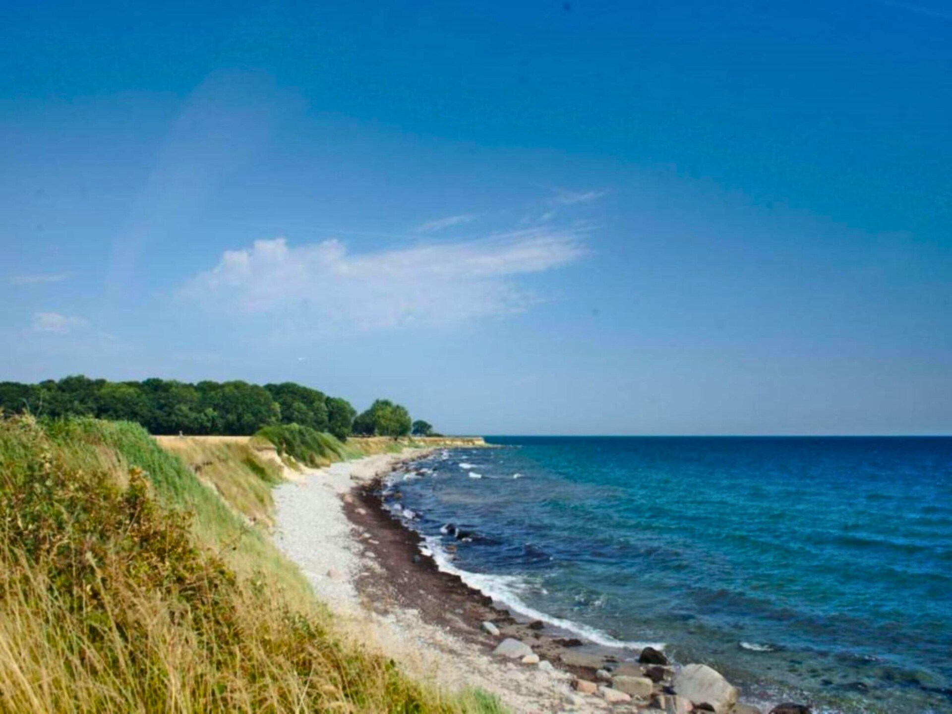 Vrijstaand vakantiehuis met omheinde tuin bij golfbaan en strand op 3 km - foto 23