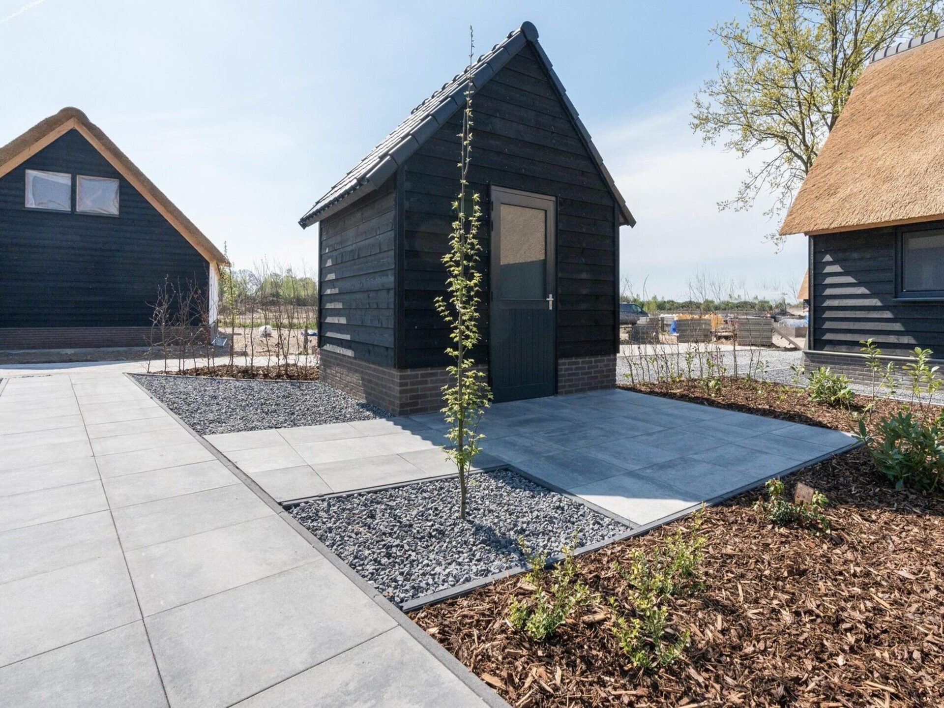 Rietgedekte bungalow met uitzicht op vijver in Parc de Kievit, Baarle-Nassau - foto 21