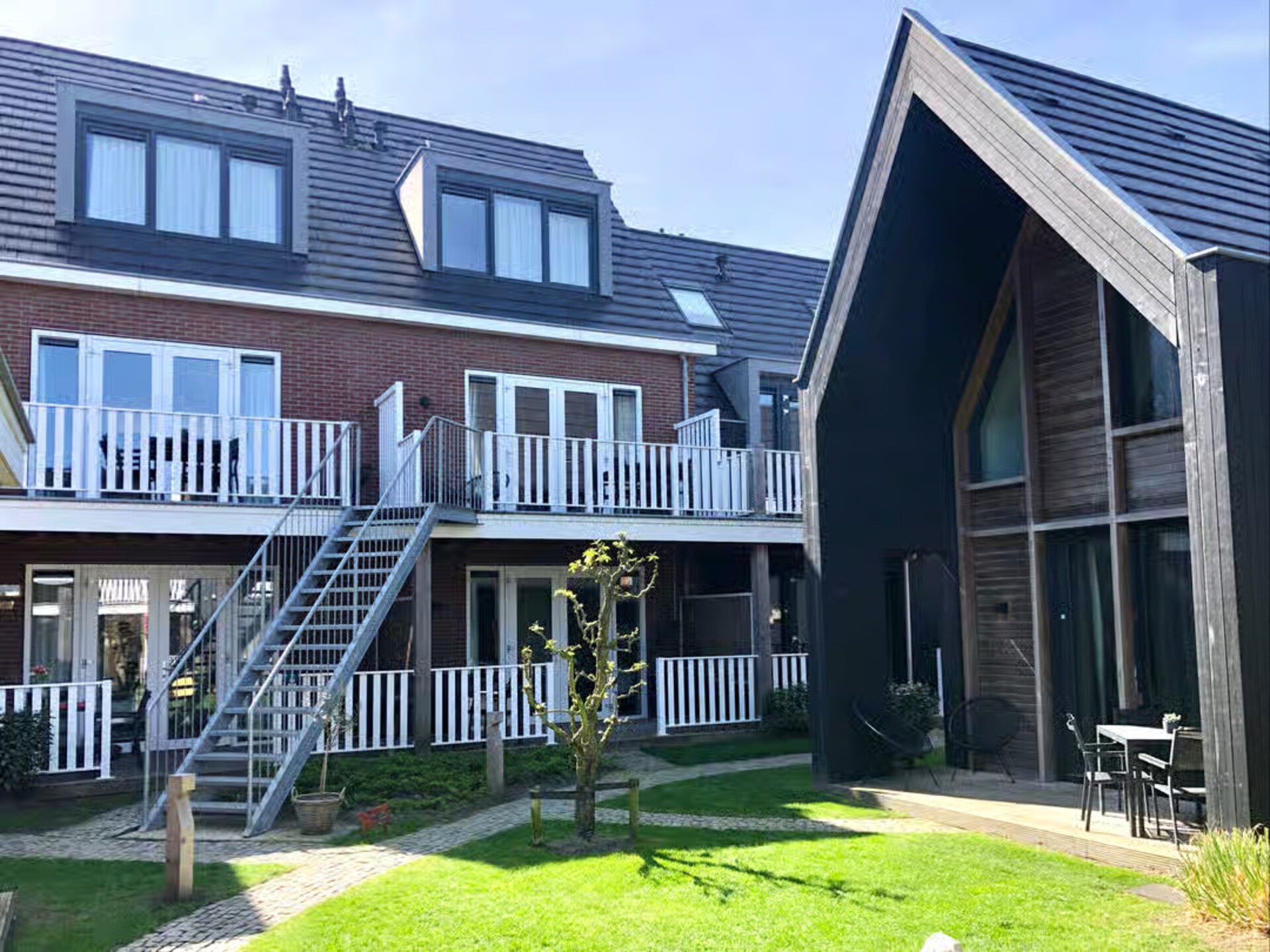 Charmante kustlodge in Zoutelande met tuin, op 150m van het strand - foto 16