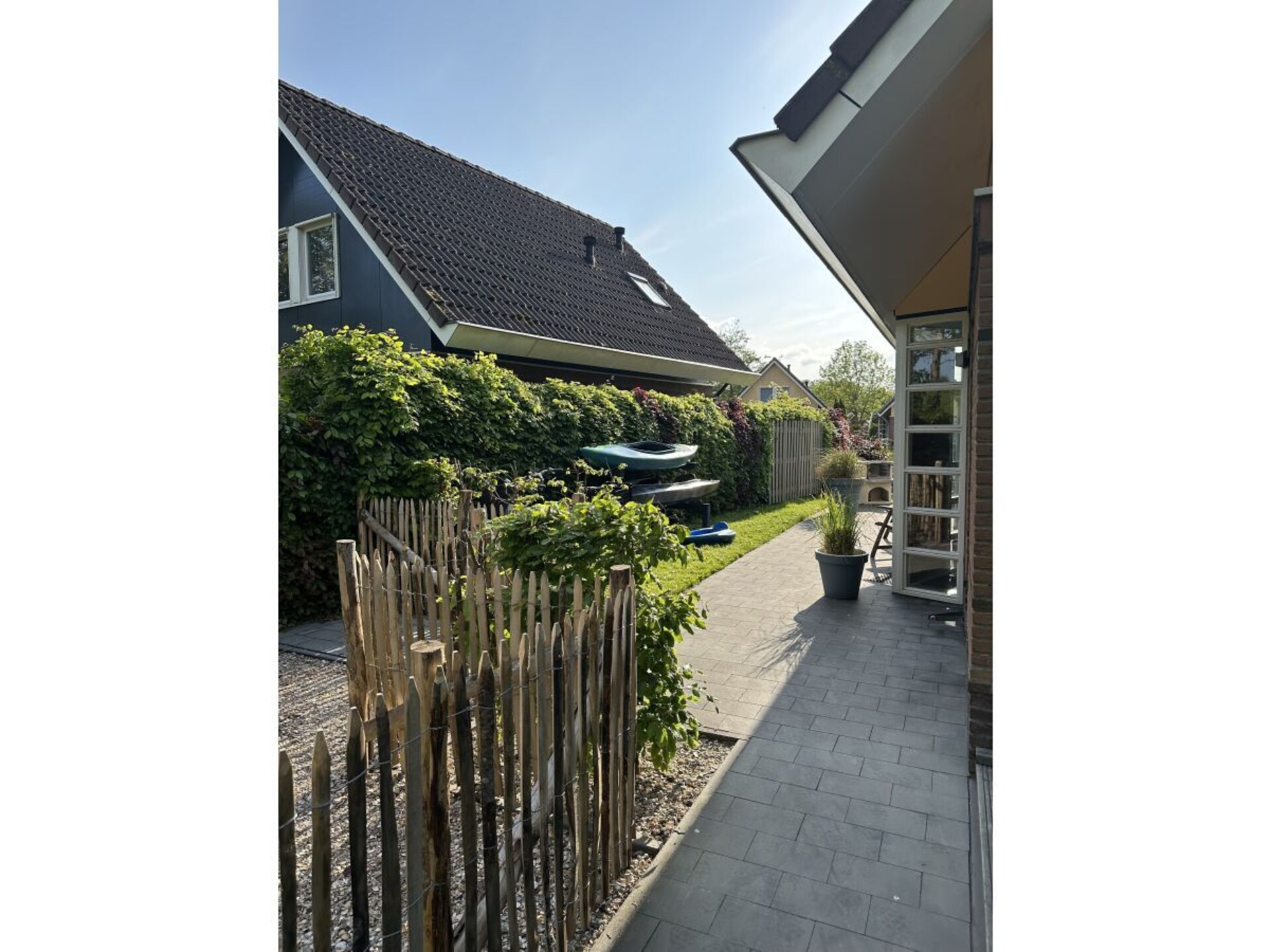 Modern vakantiehuis aan het IJsselmeer met strandtuin en eigen aanlegsteiger - foto 14