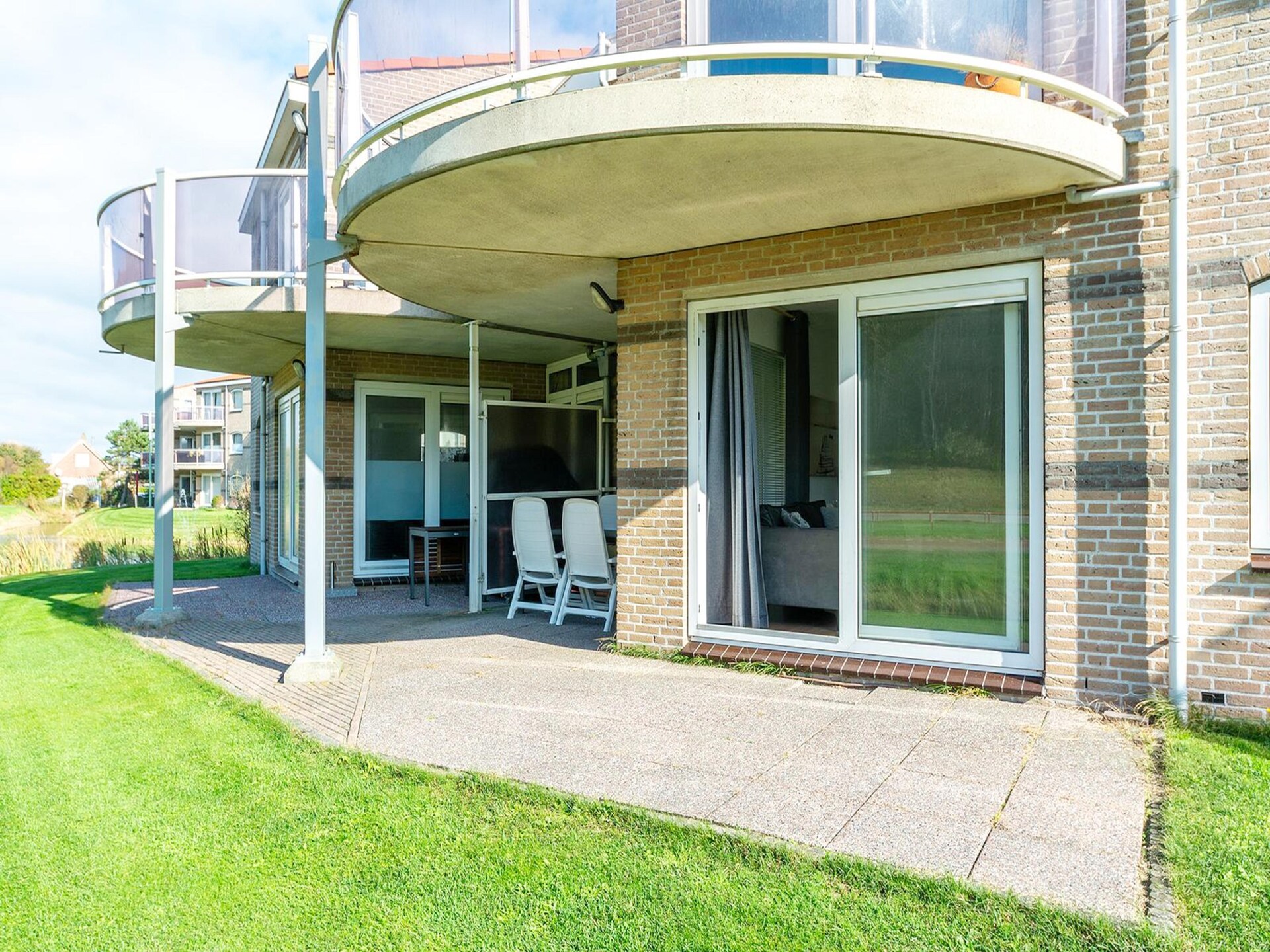 Gelijkvloers appartement met overdekt terras op 350m van het strand - foto 7