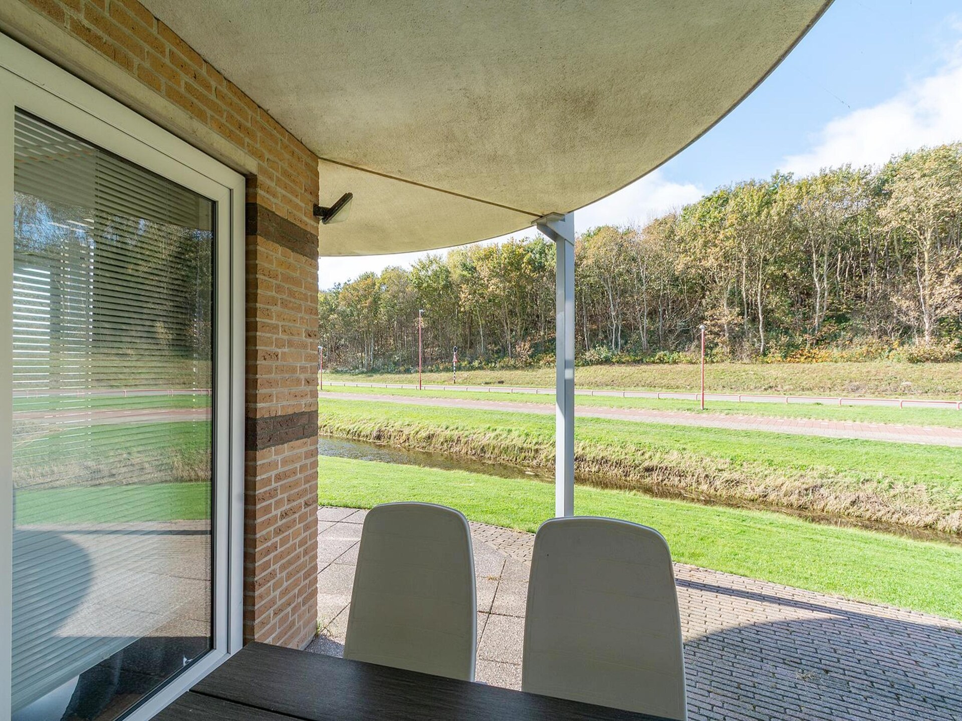 Gelijkvloers appartement met overdekt terras op 350m van het strand - foto 5