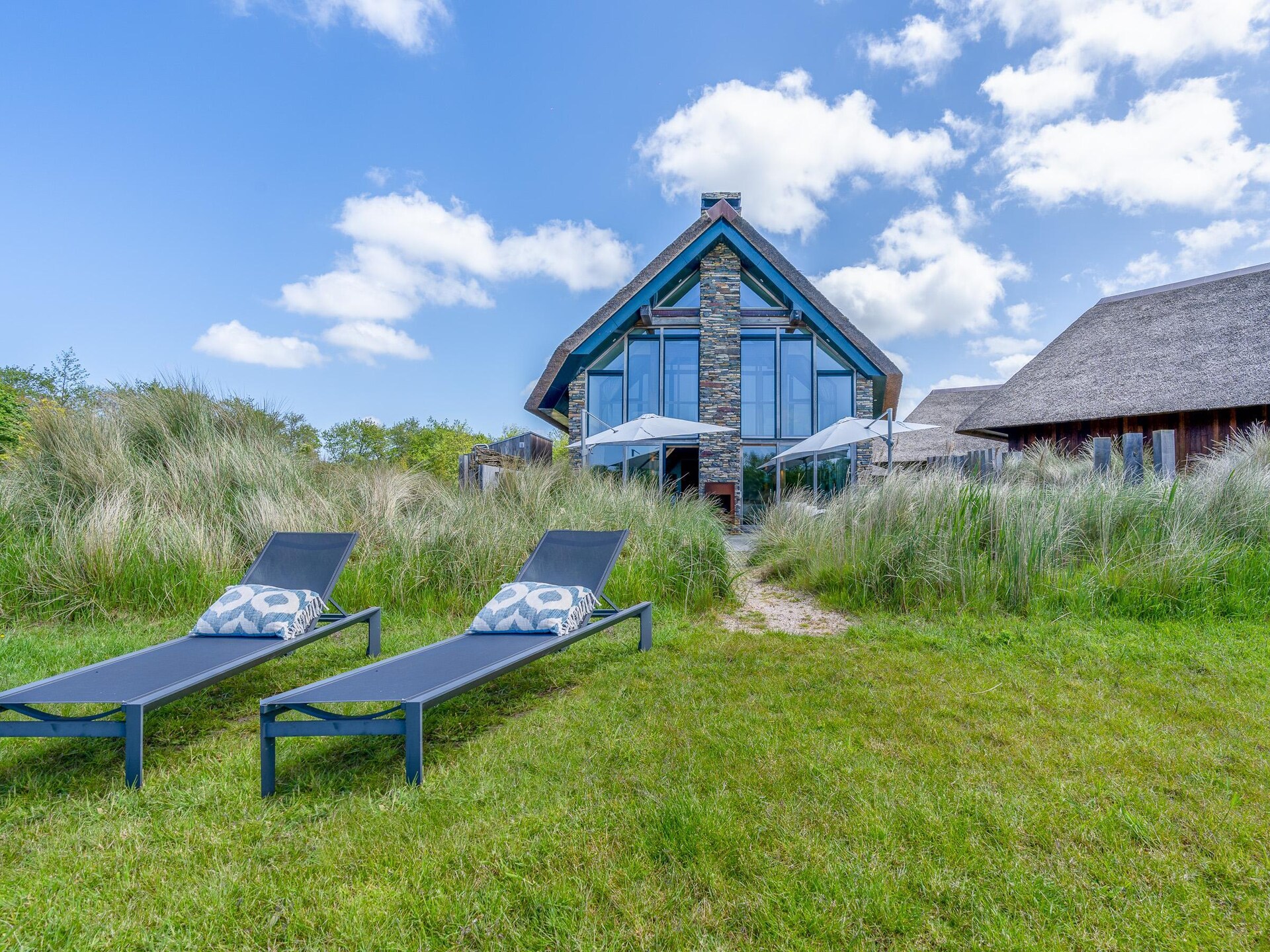 Luxe villa in bosrand De Koog met hottub, BBQ en zuidterras - foto 25