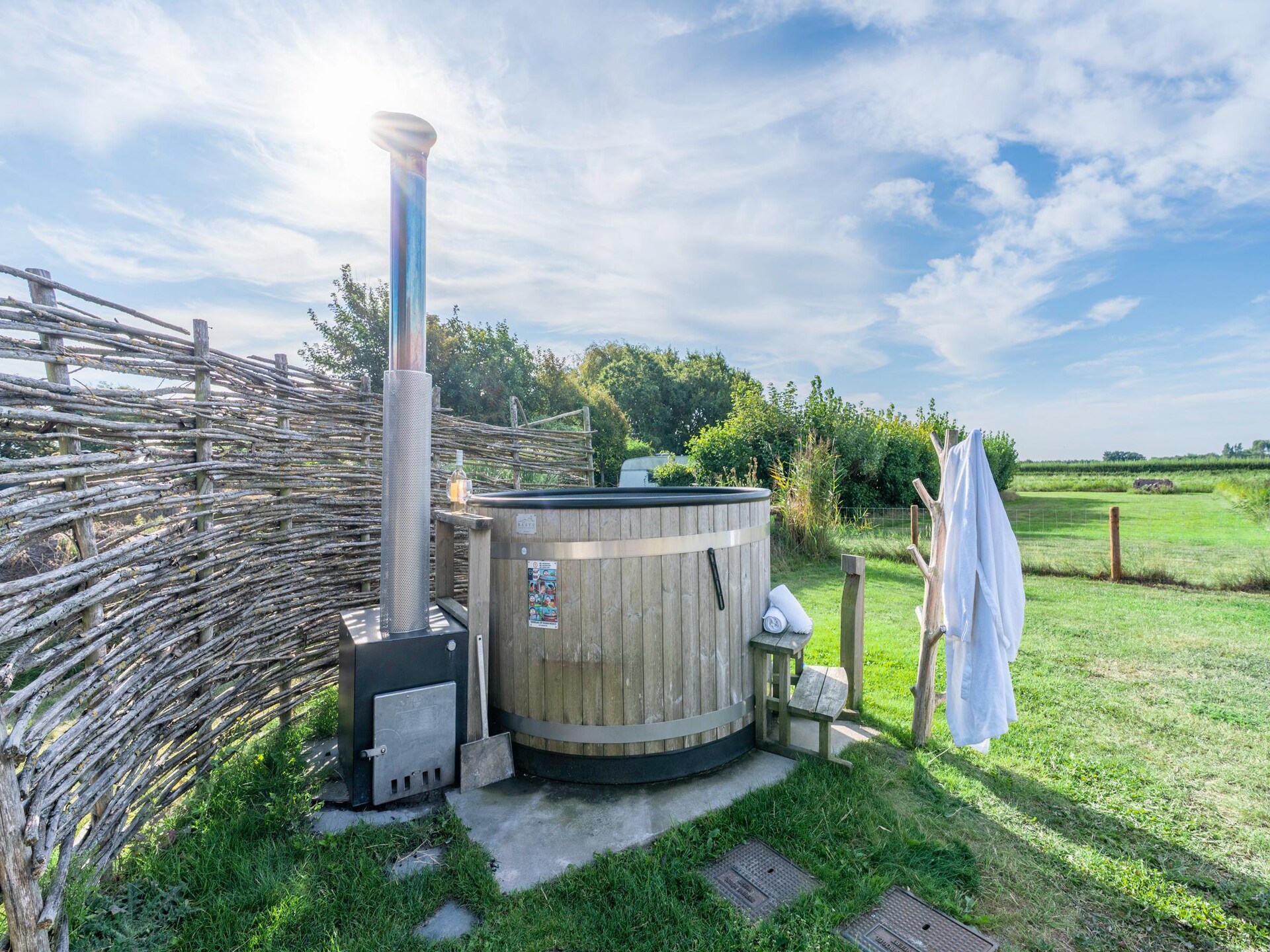 Villa Buytenplaats 187: Luxe Texelse schapenboet met hottub en buitenkeuken - foto 26