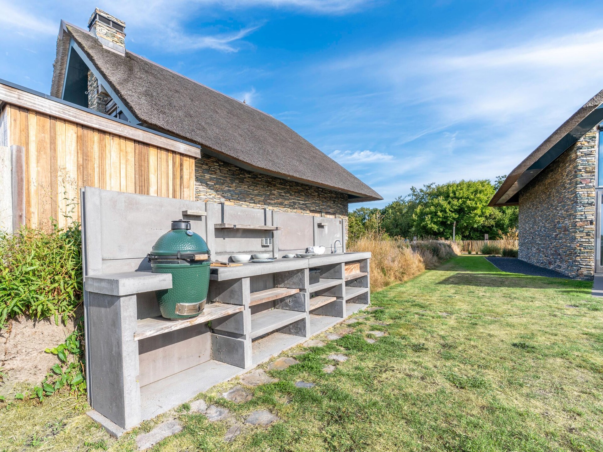 Villa Buytenplaats 187: Luxe Texelse schapenboet met hottub en buitenkeuken - foto 24