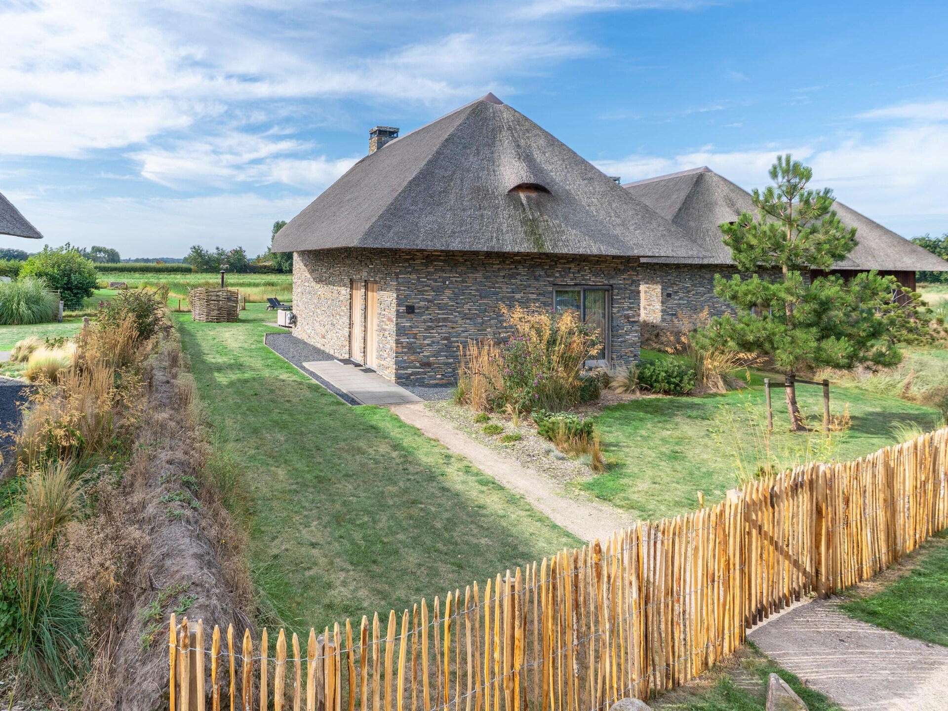 Villa Buytenplaats 187: Luxe Texelse schapenboet met hottub en buitenkeuken - foto 25