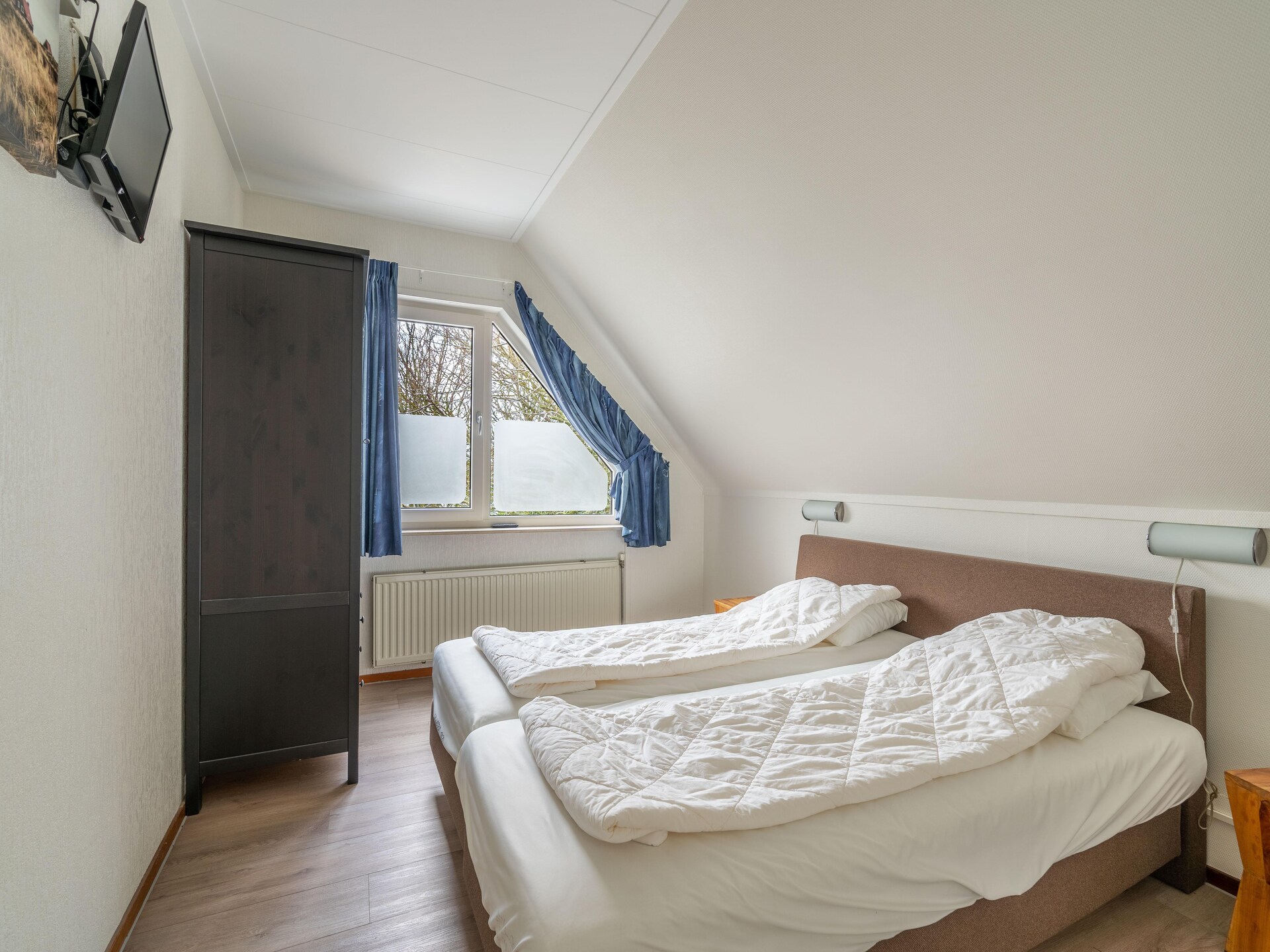 Luxe 4-persoonsvilla met sauna en whirlpool in bosrijk De Koog - foto 9