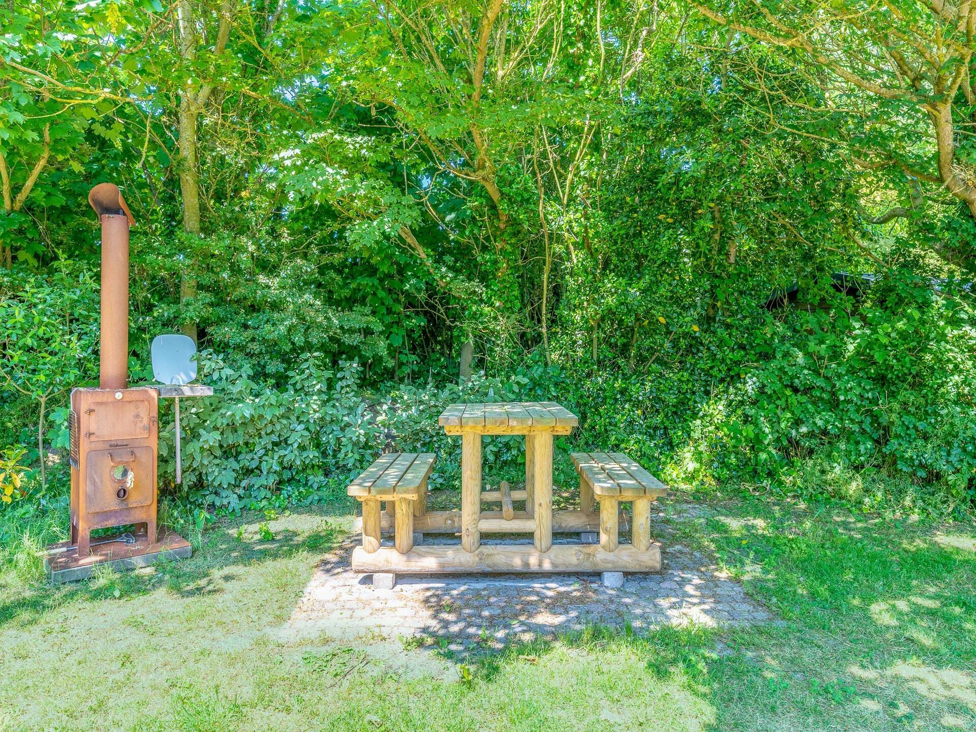 Luxe 4-persoonsvilla met sauna en whirlpool in bosrijk De Koog - foto 14