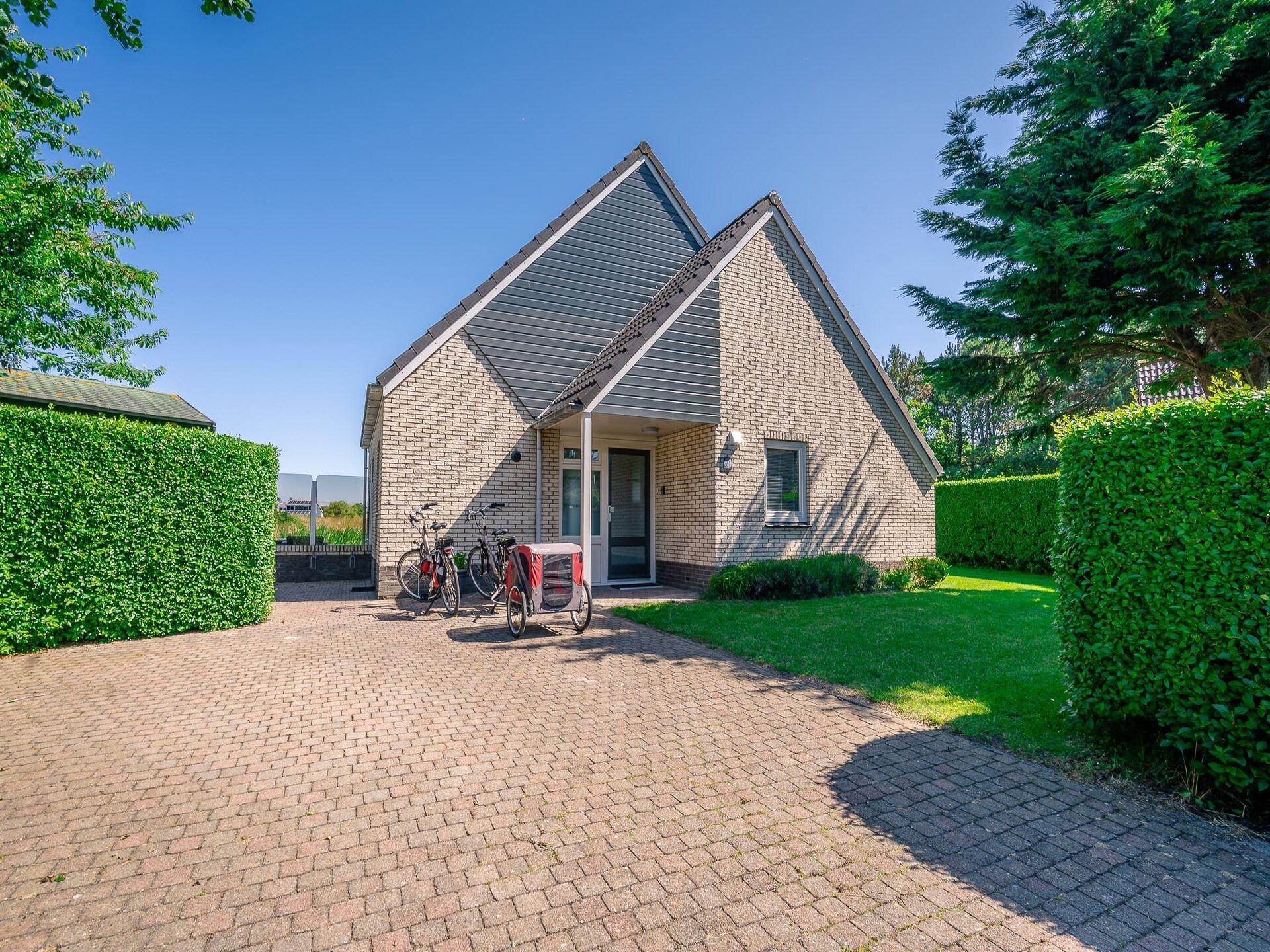 Luxe vrijstaande villa met whirlpool aan bosrand van De Koog - foto 14
