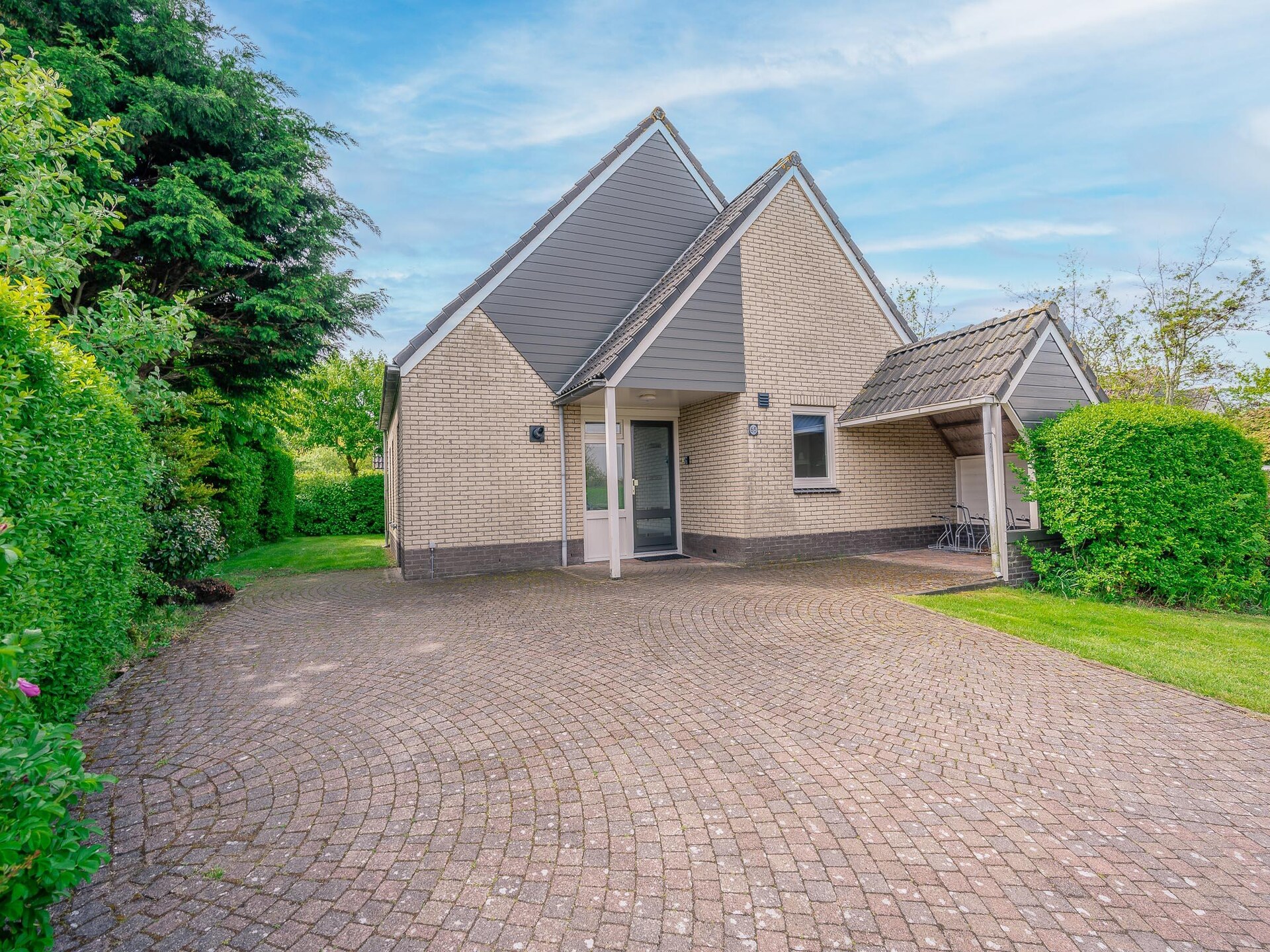 Vrijstaande villa met whirlpool op 5-sterren park in De Koog - foto 13
