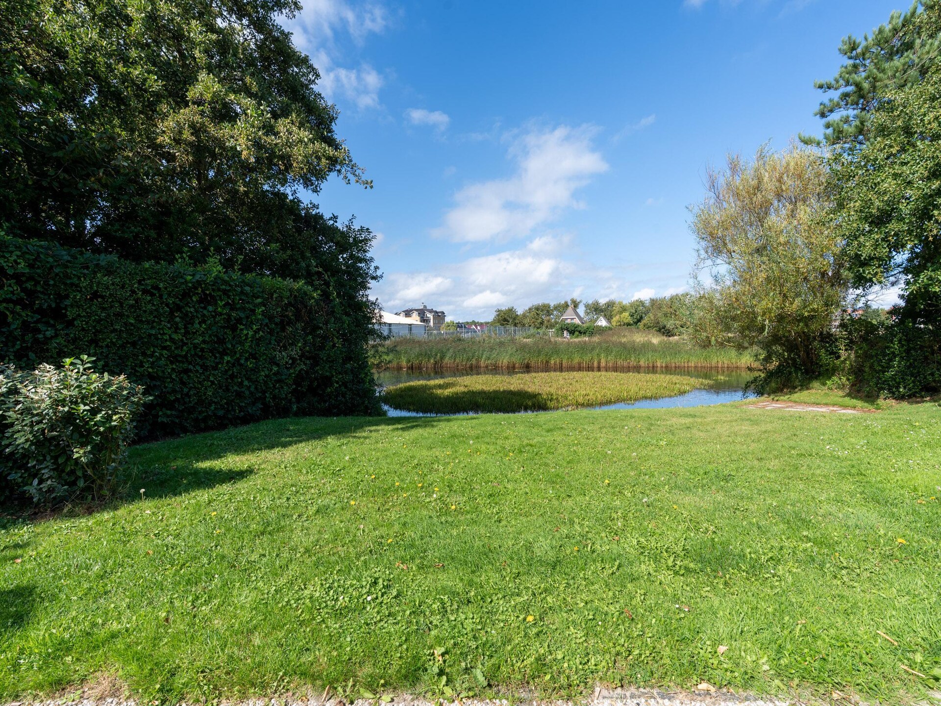 Luxe vrijstaande villa met watertuin op 5* park De Koog, Texel - foto 14