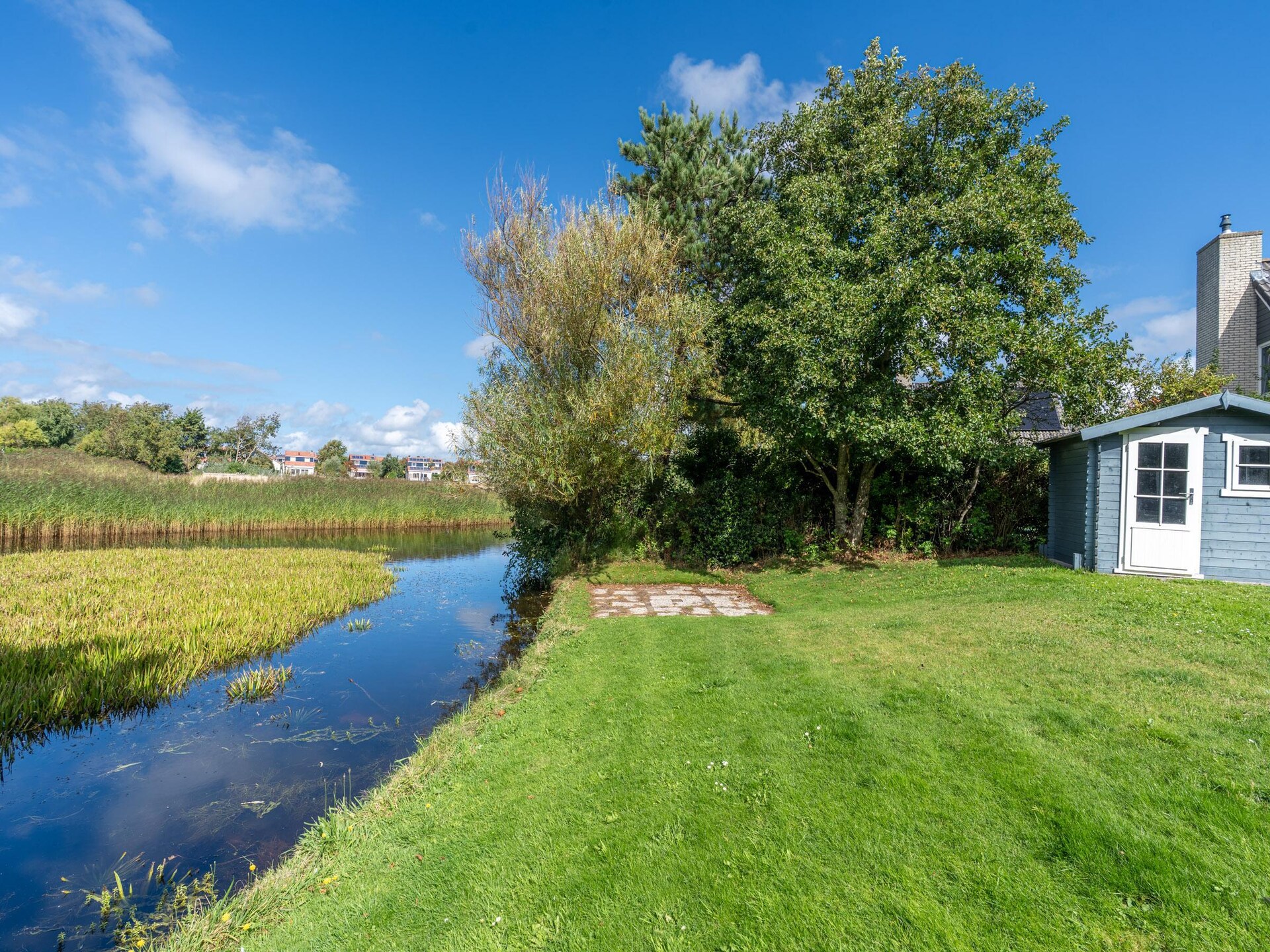 Luxe vrijstaande villa met watertuin op 5* park De Koog, Texel - foto 15