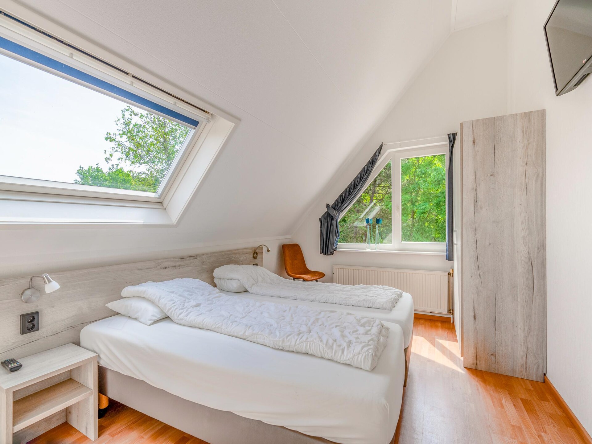 Luxe 6-persoons villa met sauna en whirlpool in bosrijk De Koog - foto 10