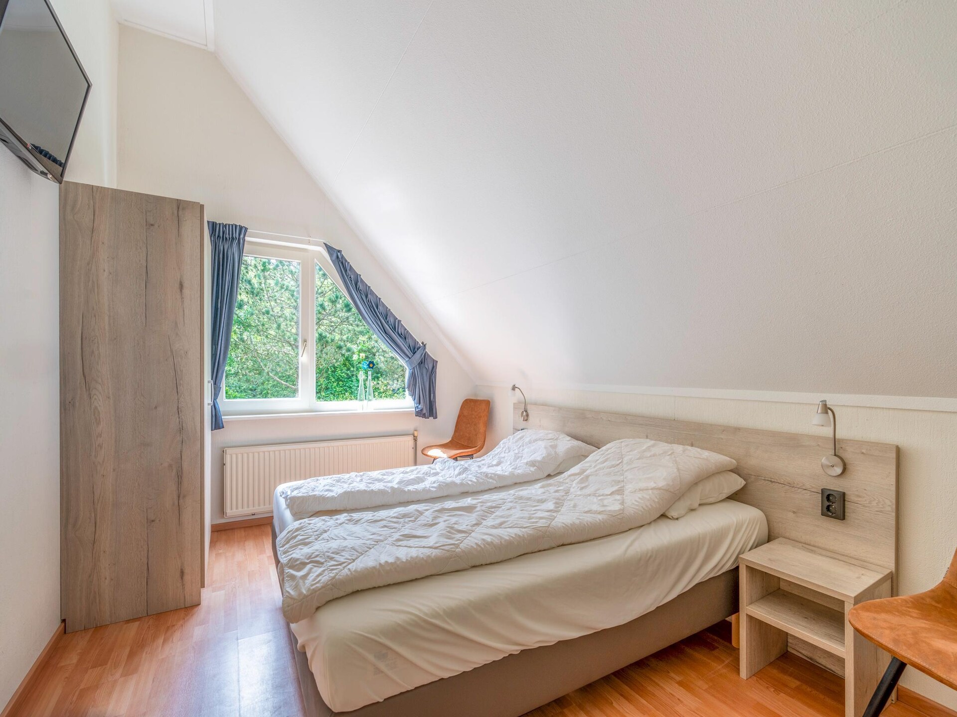Luxe 6-persoons villa met sauna en whirlpool in bosrijk De Koog - foto 11