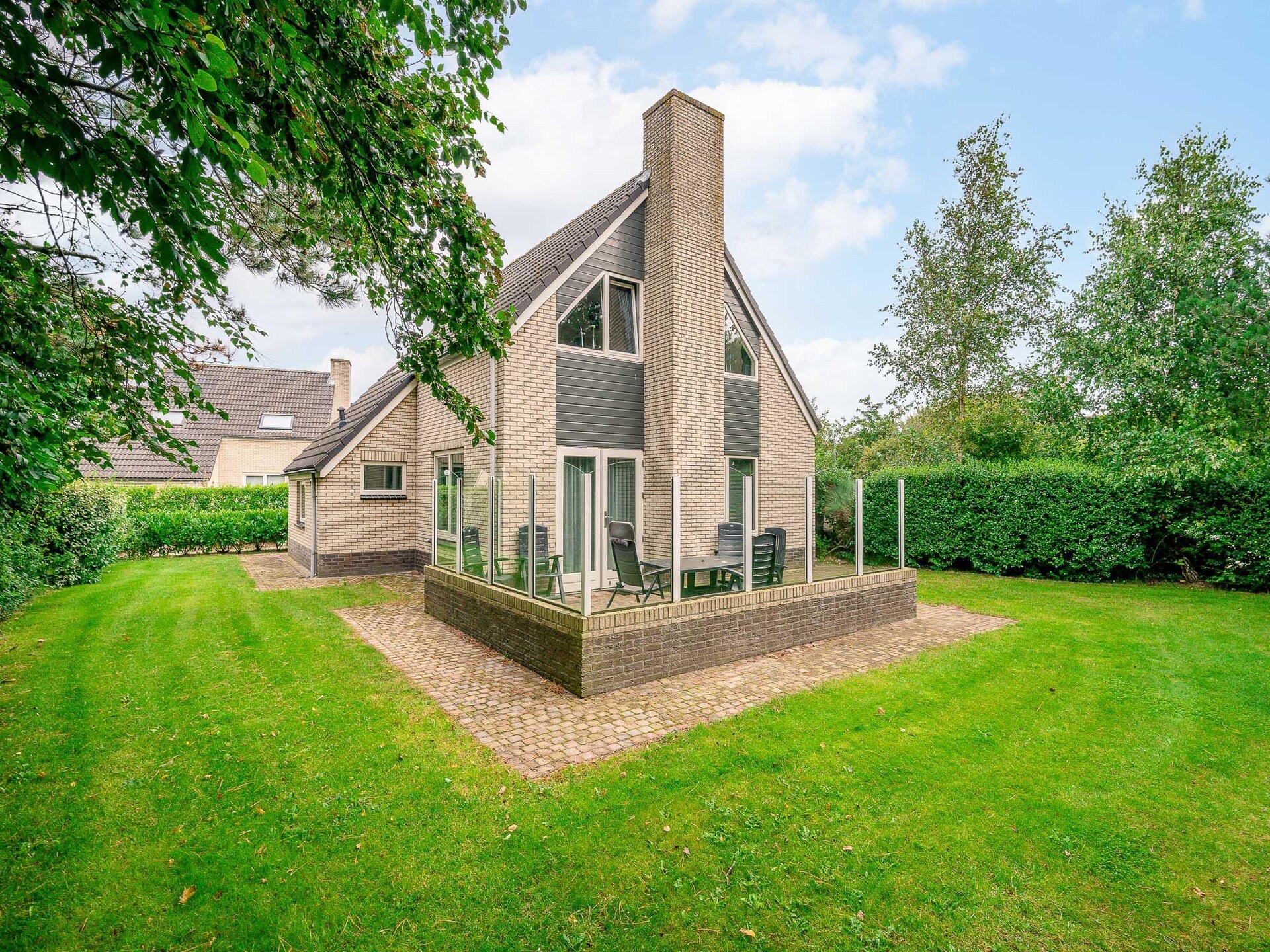 Luxe 6-persoons villa met sauna en whirlpool in bosrijk De Koog - foto 2