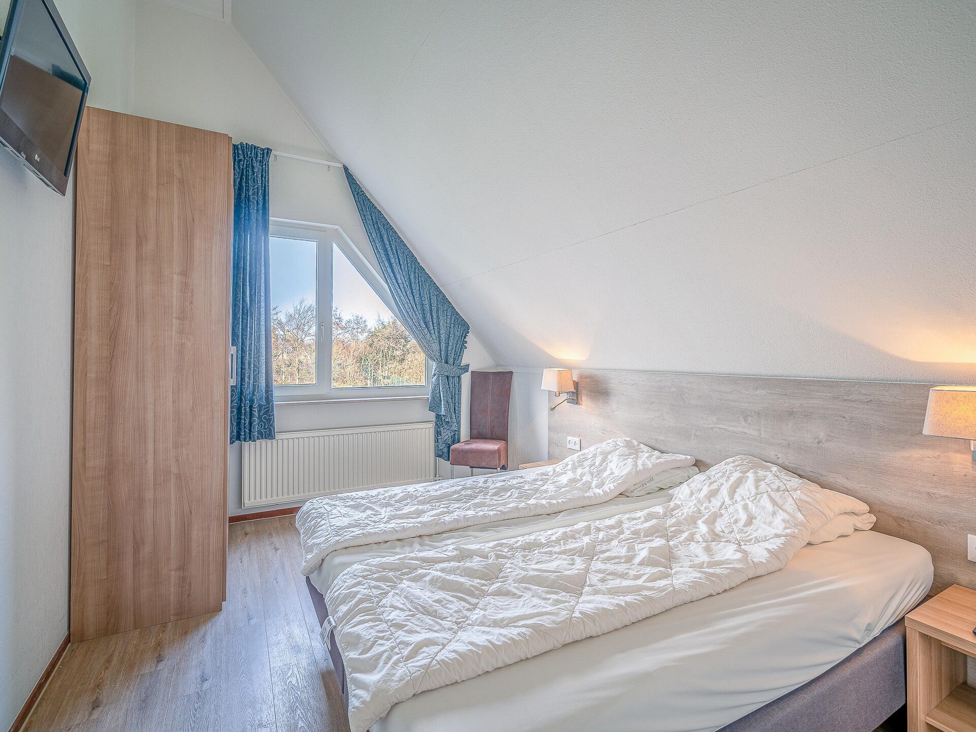 Luxe 6-persoons villa met sauna en whirlpool in het bos bij De Koog - foto 11