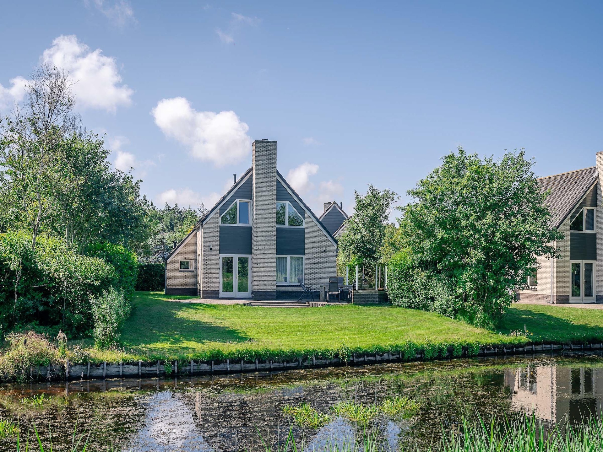 Luxe 6-persoons villa met sauna en whirlpool in het bos bij De Koog - foto 2