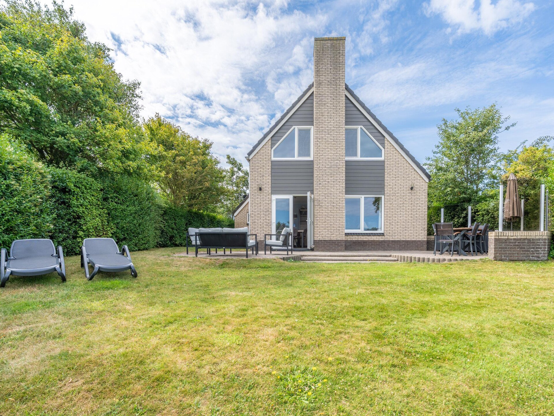 Luxe 6-persoons villa met sauna en whirlpool in het bos bij De Koog - foto 18