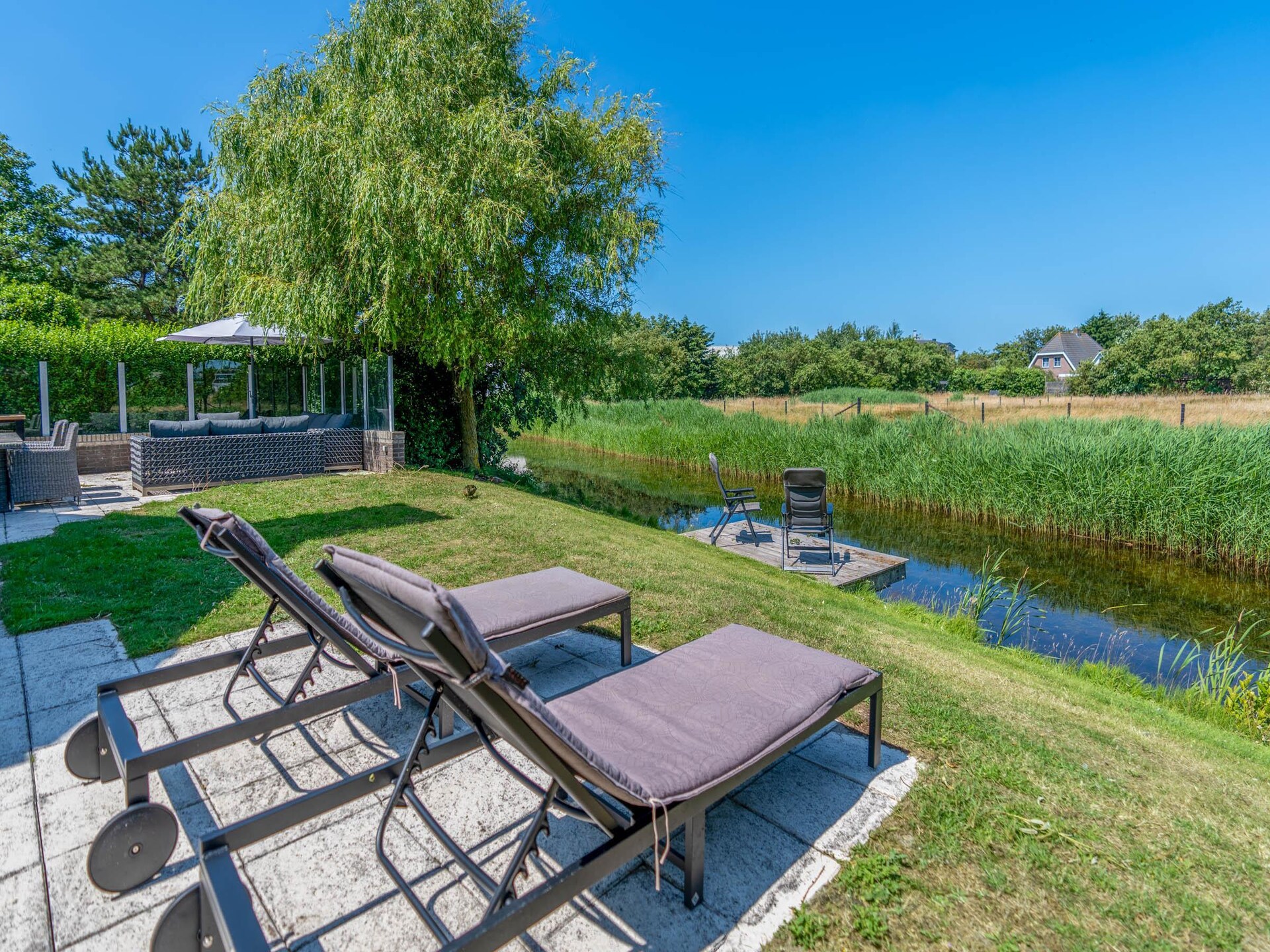 Luxe 6-persoons villa aan het water op 5* park Kamperfoelie, De Koog - foto 2