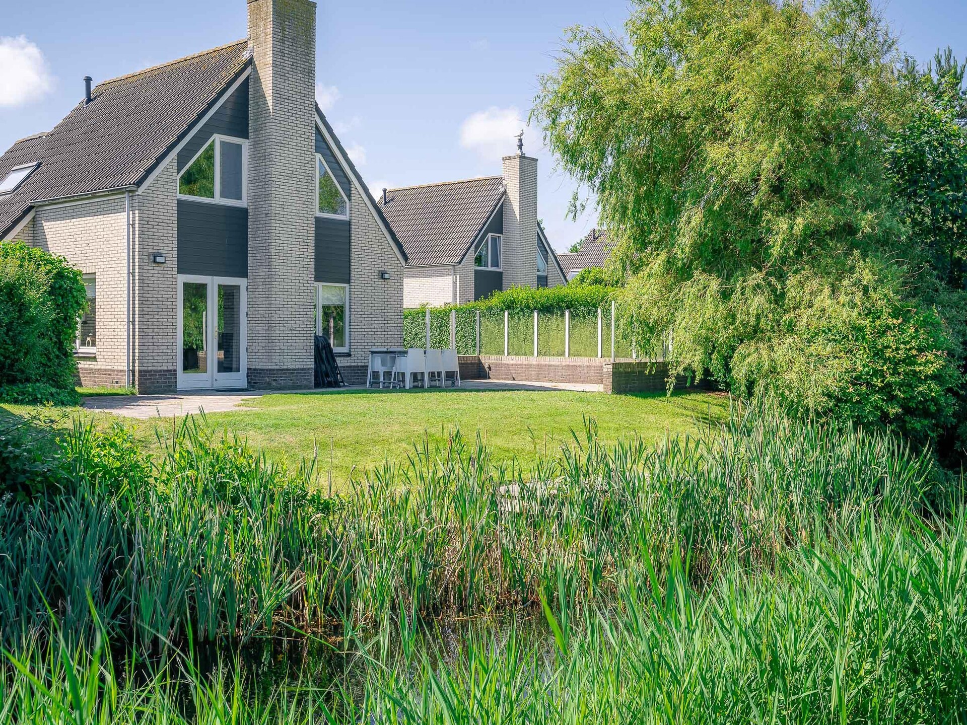 Luxe 6-persoons villa aan het water op 5* park Kamperfoelie, De Koog - foto 19