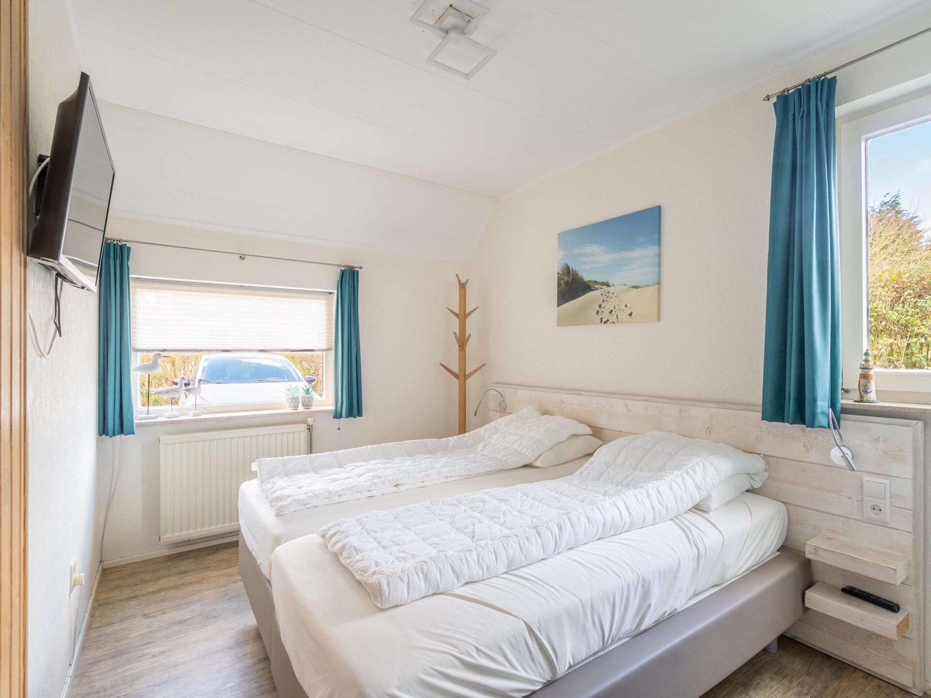 Luxe 6-persoons villa met sauna en whirlpool in bosrijk park bij De Koog - foto 10