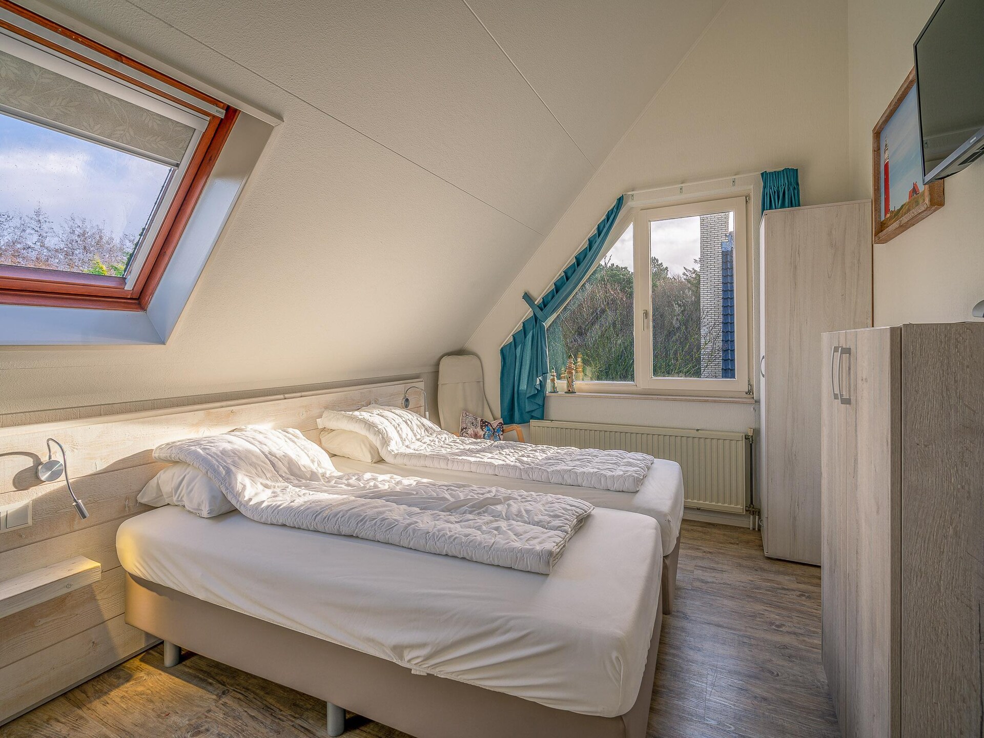 Luxe 6-persoons villa met sauna en whirlpool in bosrijk park bij De Koog - foto 12