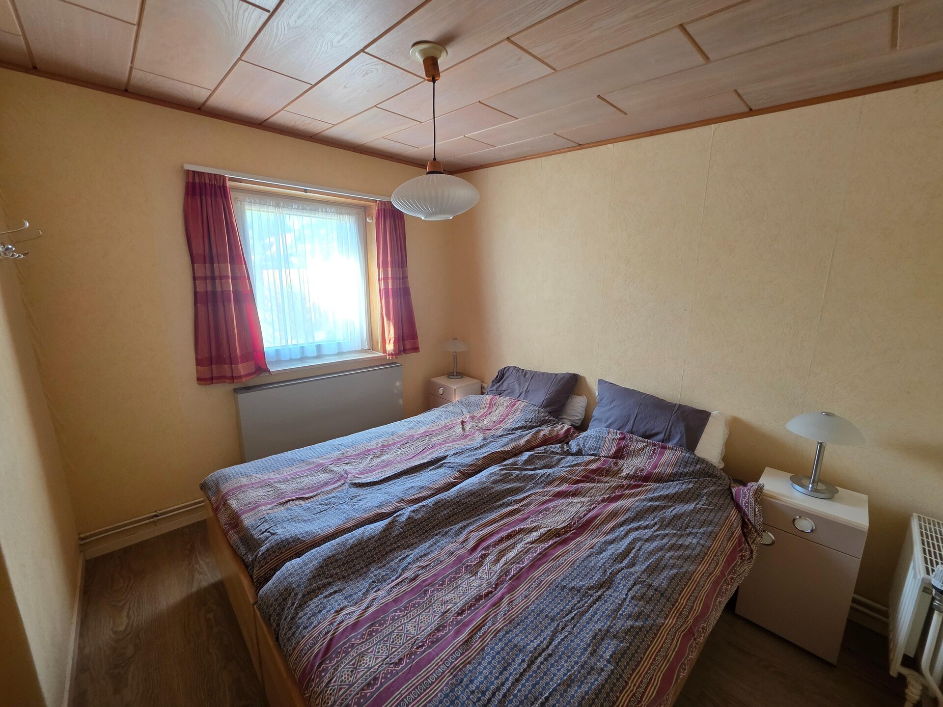 Vrijstaande familiebungalow met zonnige tuin in het bos bij De Koog - foto 7