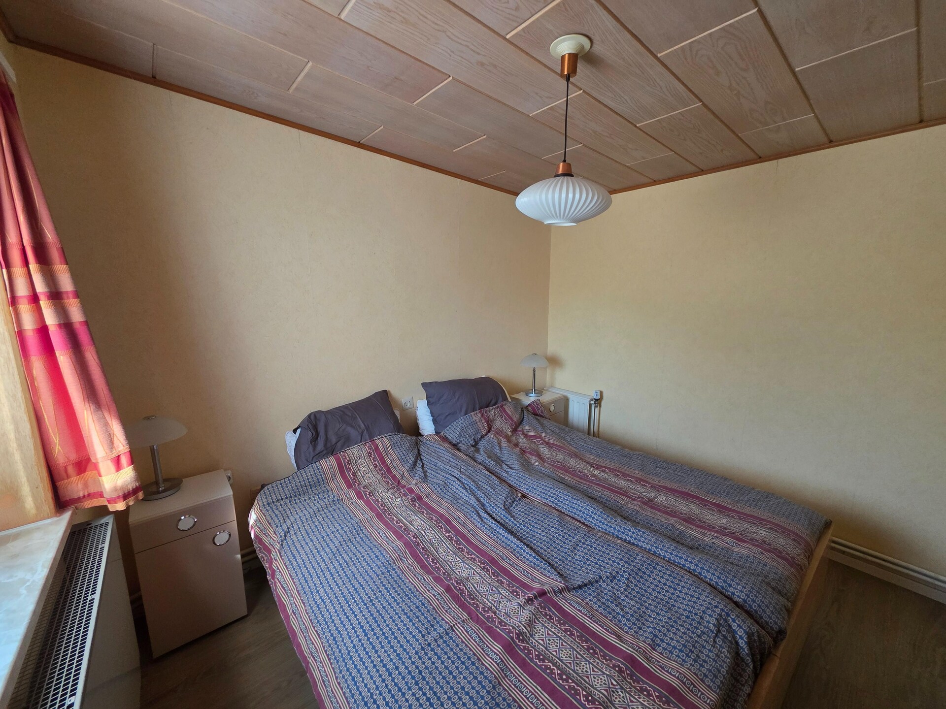 Vrijstaande familiebungalow met zonnige tuin in het bos bij De Koog - foto 8