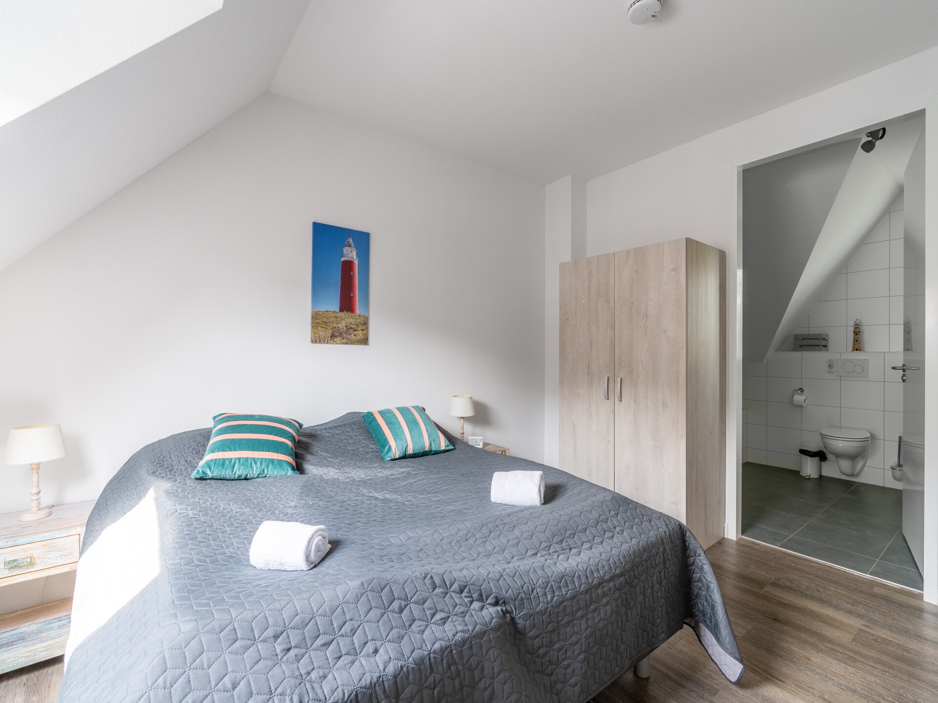 Luxe 10-persoons villa met sauna in bosrijke omgeving van De Koog - foto 18