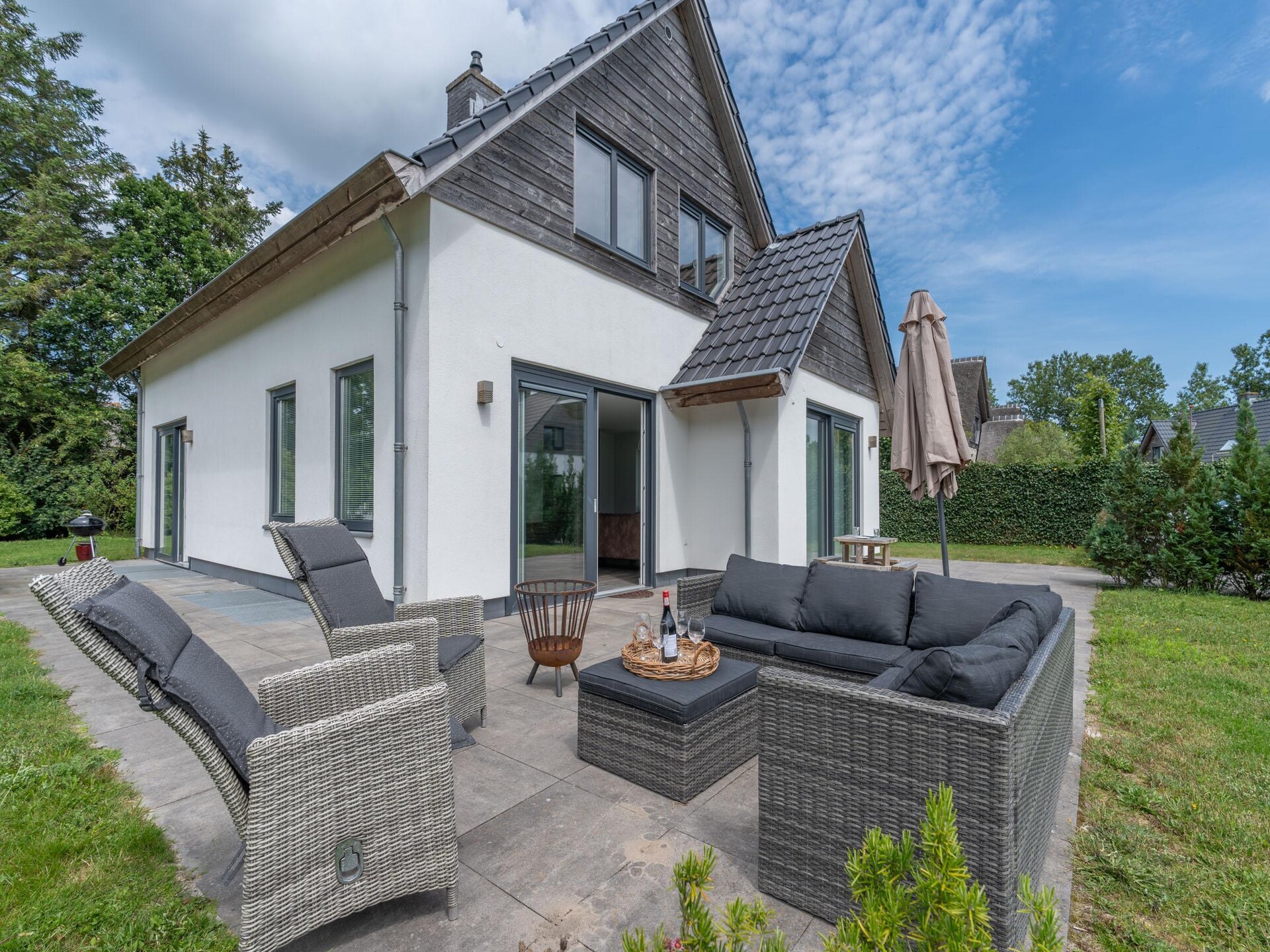 Luxe 10-persoons villa met sauna in bosrijke omgeving van De Koog - foto 3