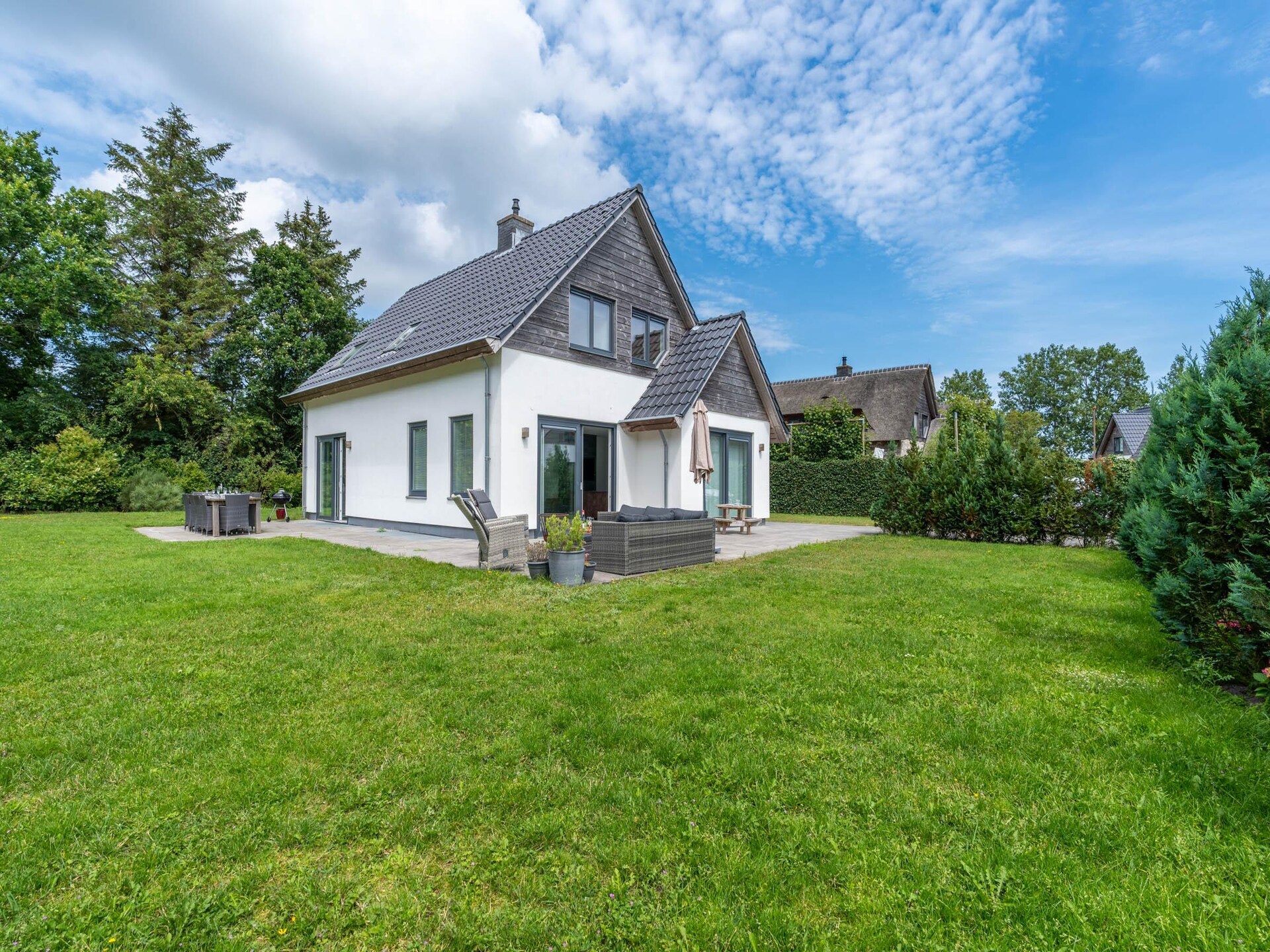 Luxe 10-persoons villa met sauna in bosrijke omgeving van De Koog - foto 32