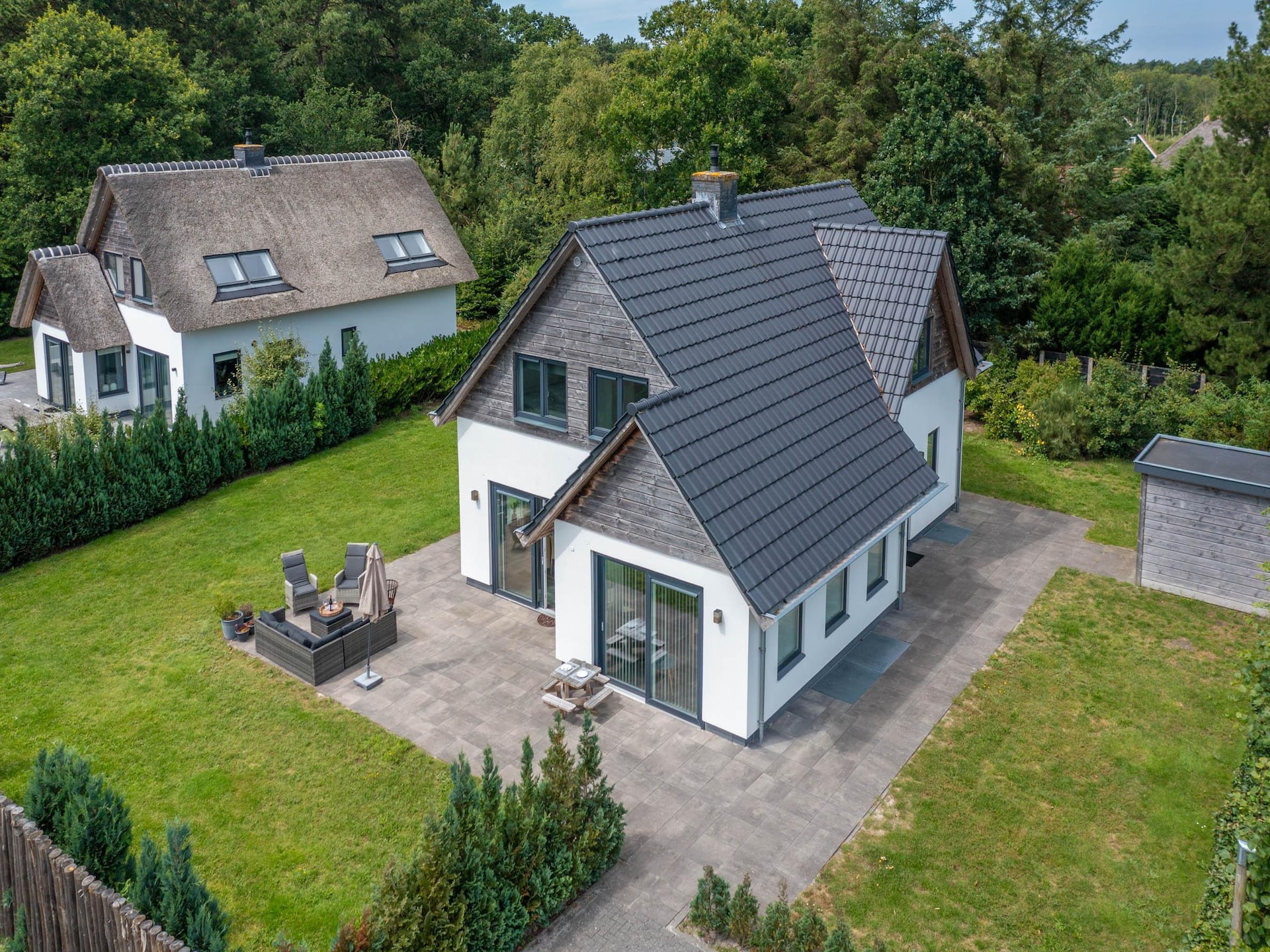 Luxe 10-persoons villa met sauna in bosrijke omgeving van De Koog - foto 31