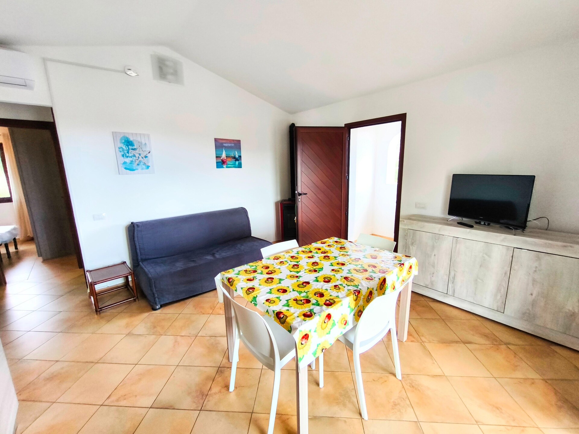 Licht appartement in Budoni met weids zeezicht en terras - foto 9