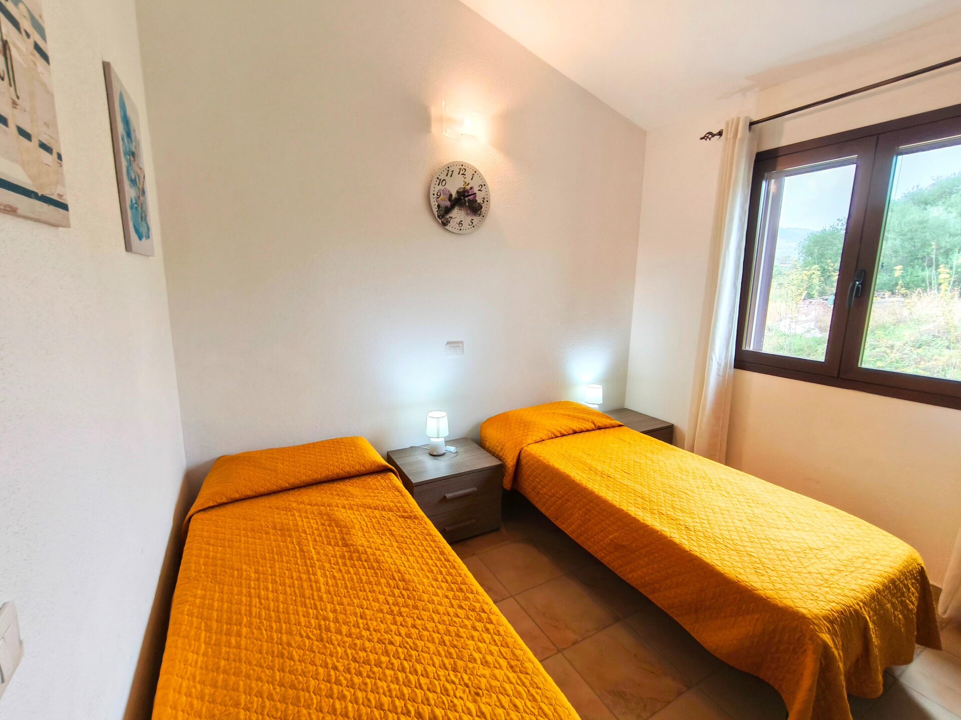 Licht appartement in Budoni met weids zeezicht en terras - foto 12