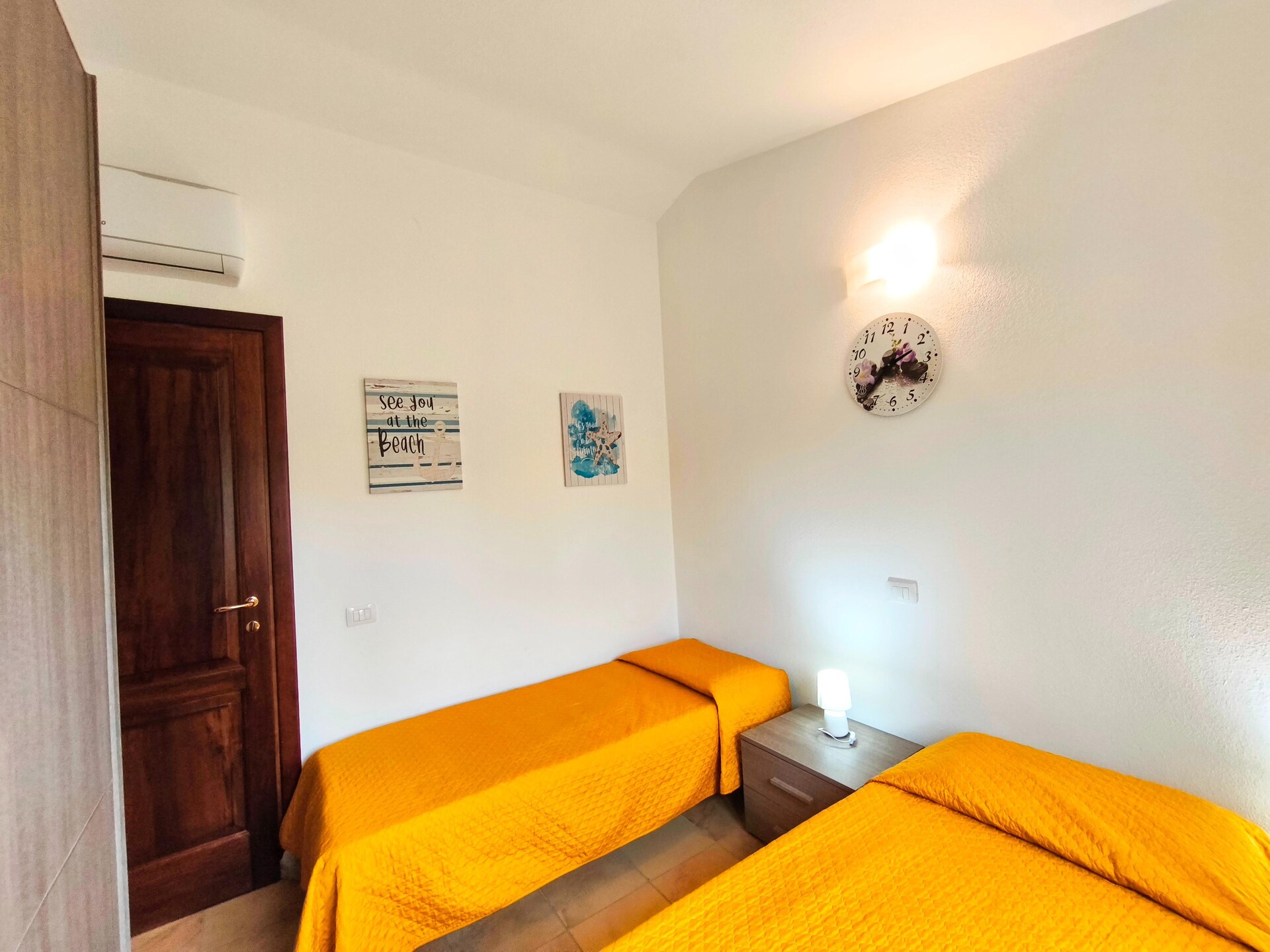 Licht appartement in Budoni met weids zeezicht en terras - foto 14