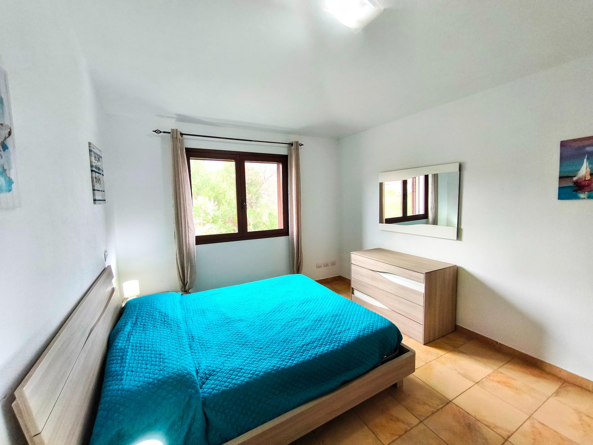 Licht appartement in Budoni met weids zeezicht en terras - foto 16