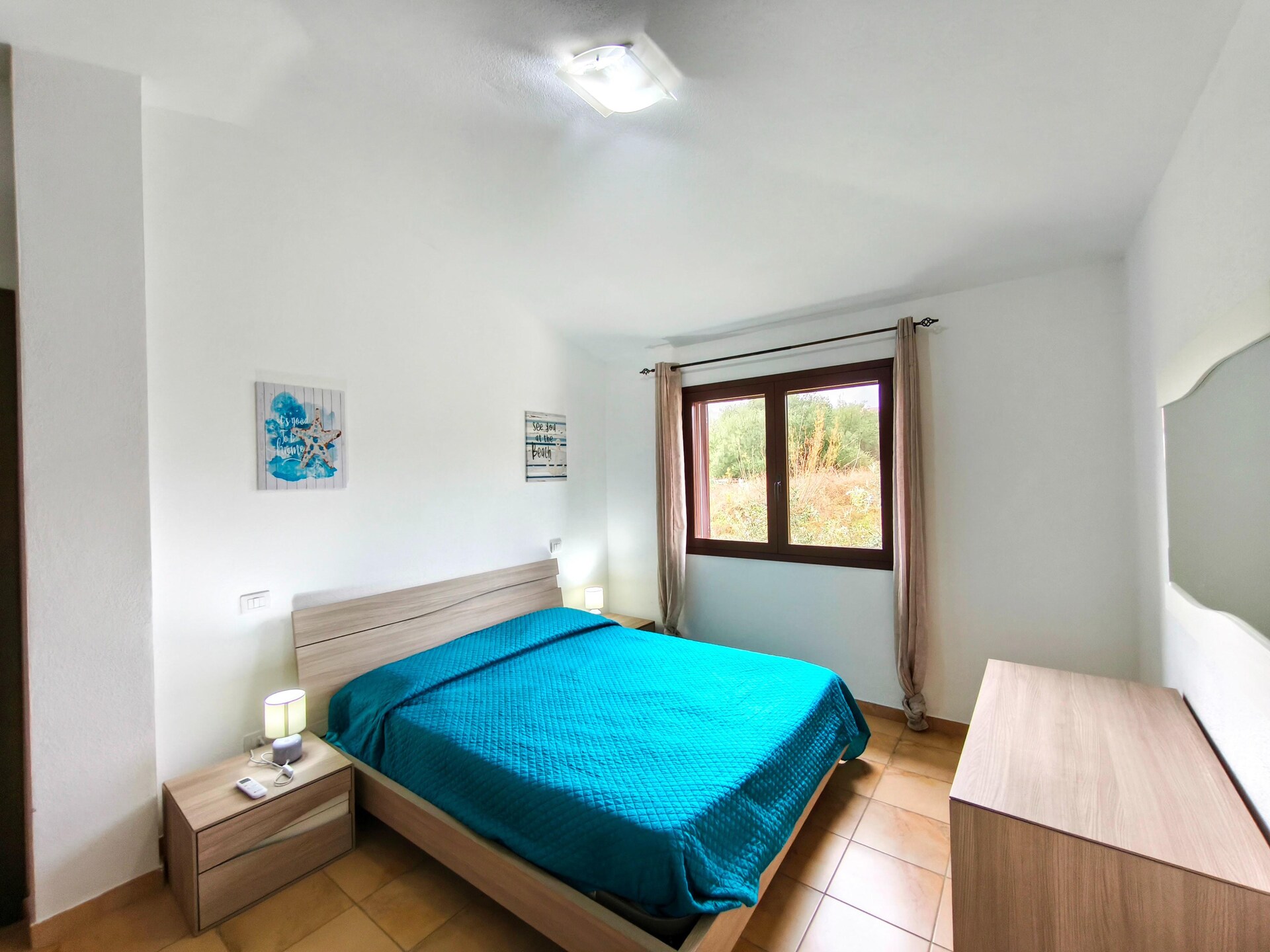 Licht appartement in Budoni met weids zeezicht en terras - foto 3