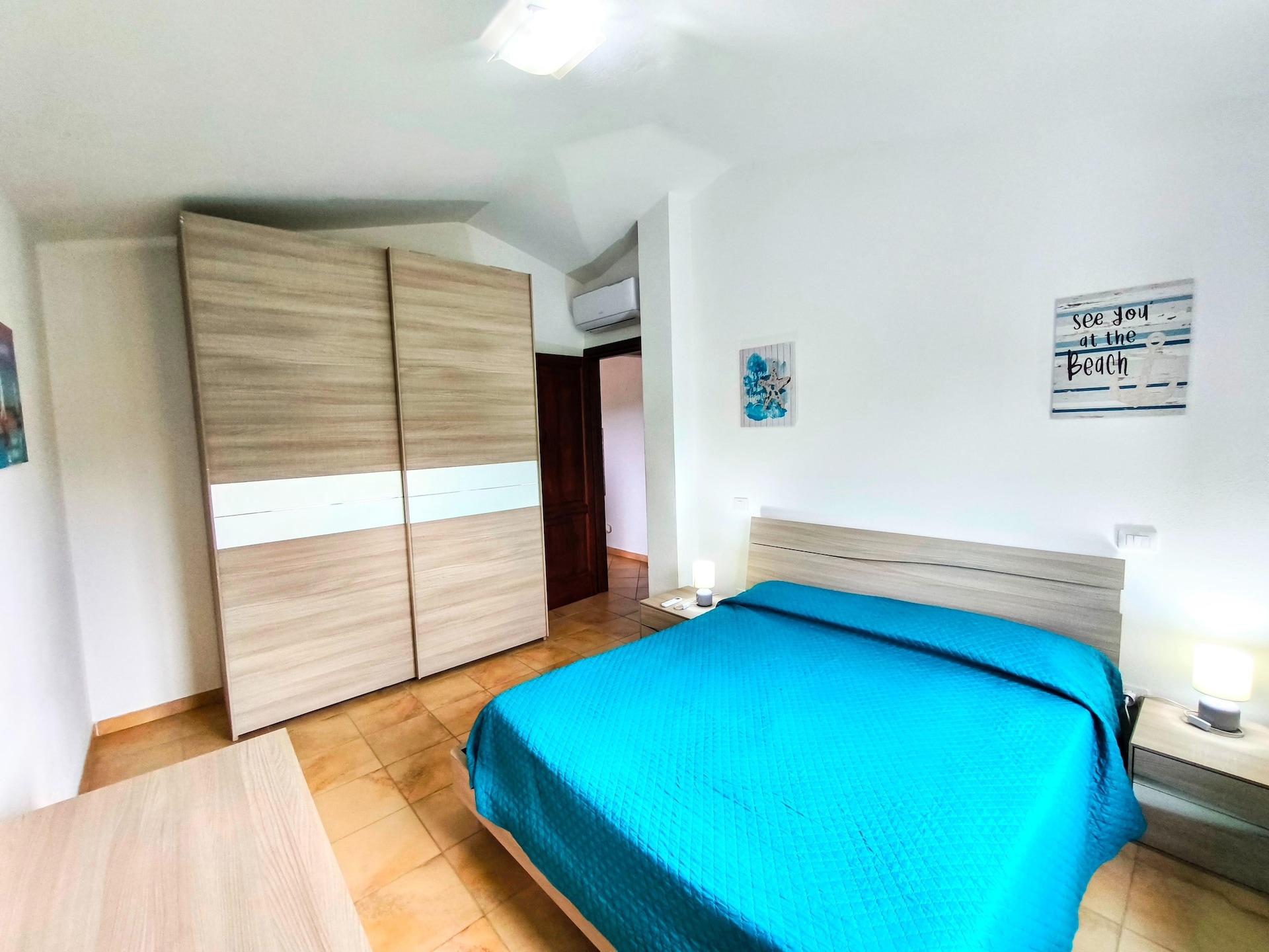 Licht appartement in Budoni met weids zeezicht en terras - foto 17