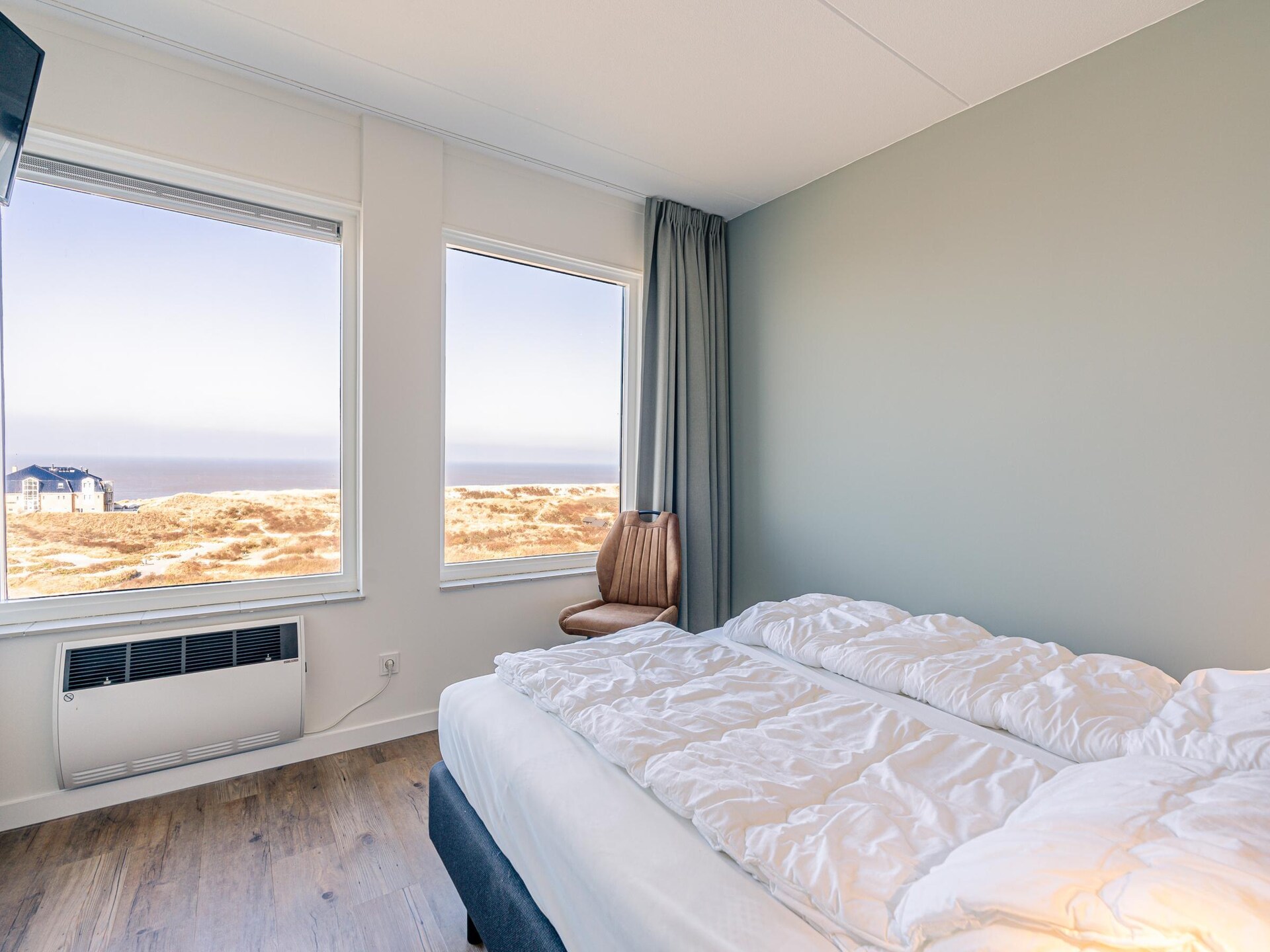 Modern hoekappartement met panoramisch zeezicht in bosrijke omgeving - foto 8