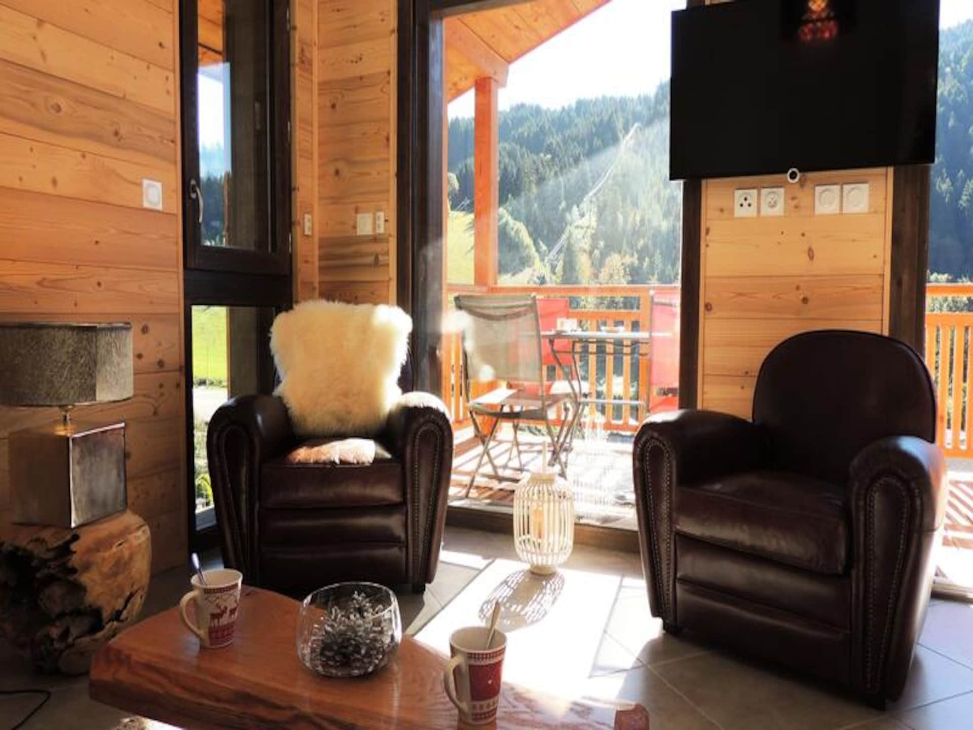 Duplex appartement met panoramisch uitzicht op de pistes in Les Gets - foto 10