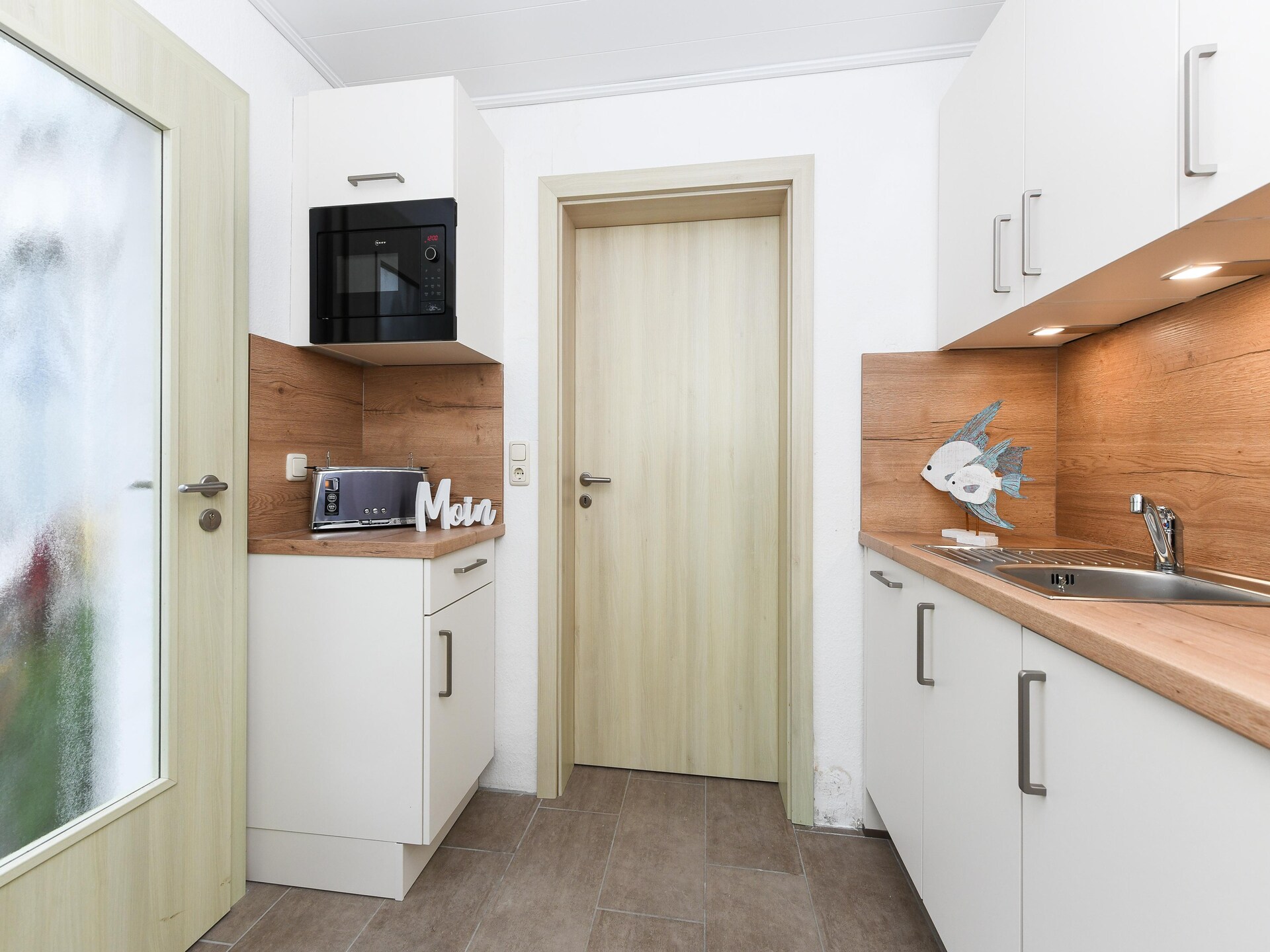 Licht appartement met wintertuin op loopafstand van het strand in Bensersiel - foto 13