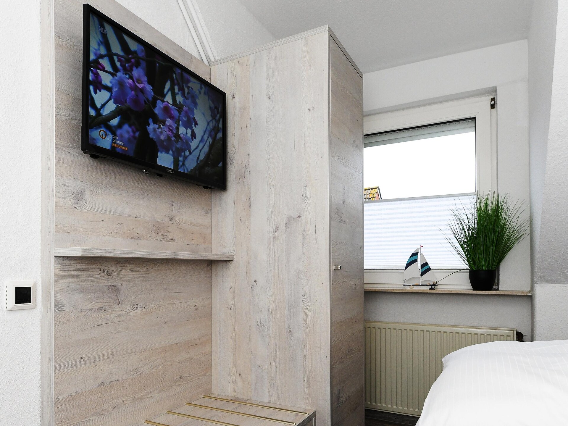 Op 850 m van zee: Knus appartement Haus Strandkorb 7 in Bensersiel - foto 15