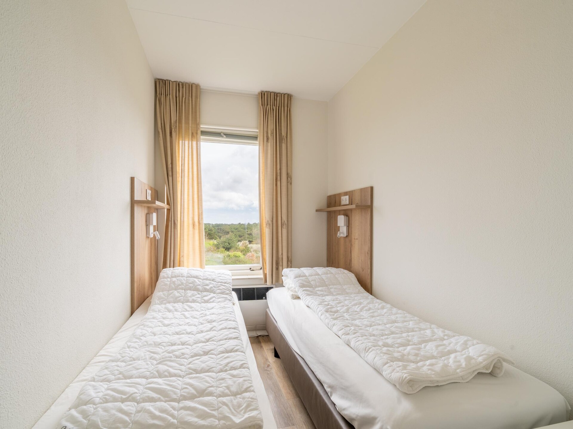 Juliana 170: Gezellig appartement met uitzicht over bos en zee in De Koog - foto 10