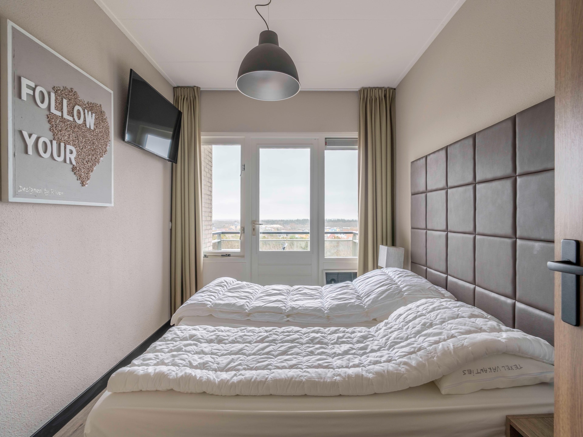 Sfeervol appartement met bos- en zeezicht in hartje De Koog - foto 8