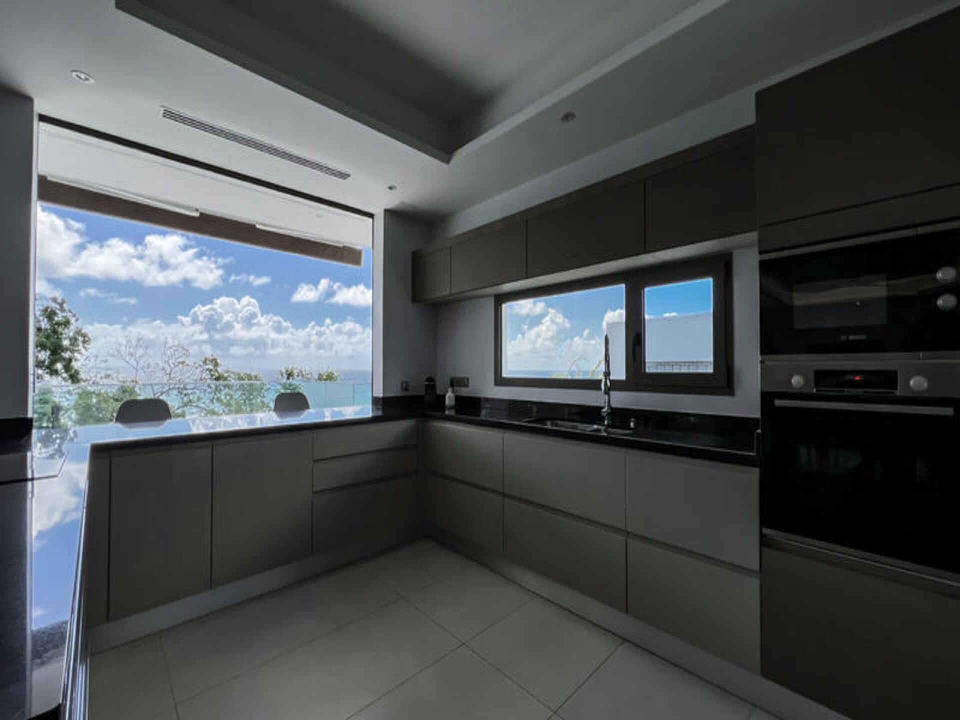 Villa Aqua: Luxe aan Zee met Infinity Pool en 4 Suites in Saint-François - foto 8