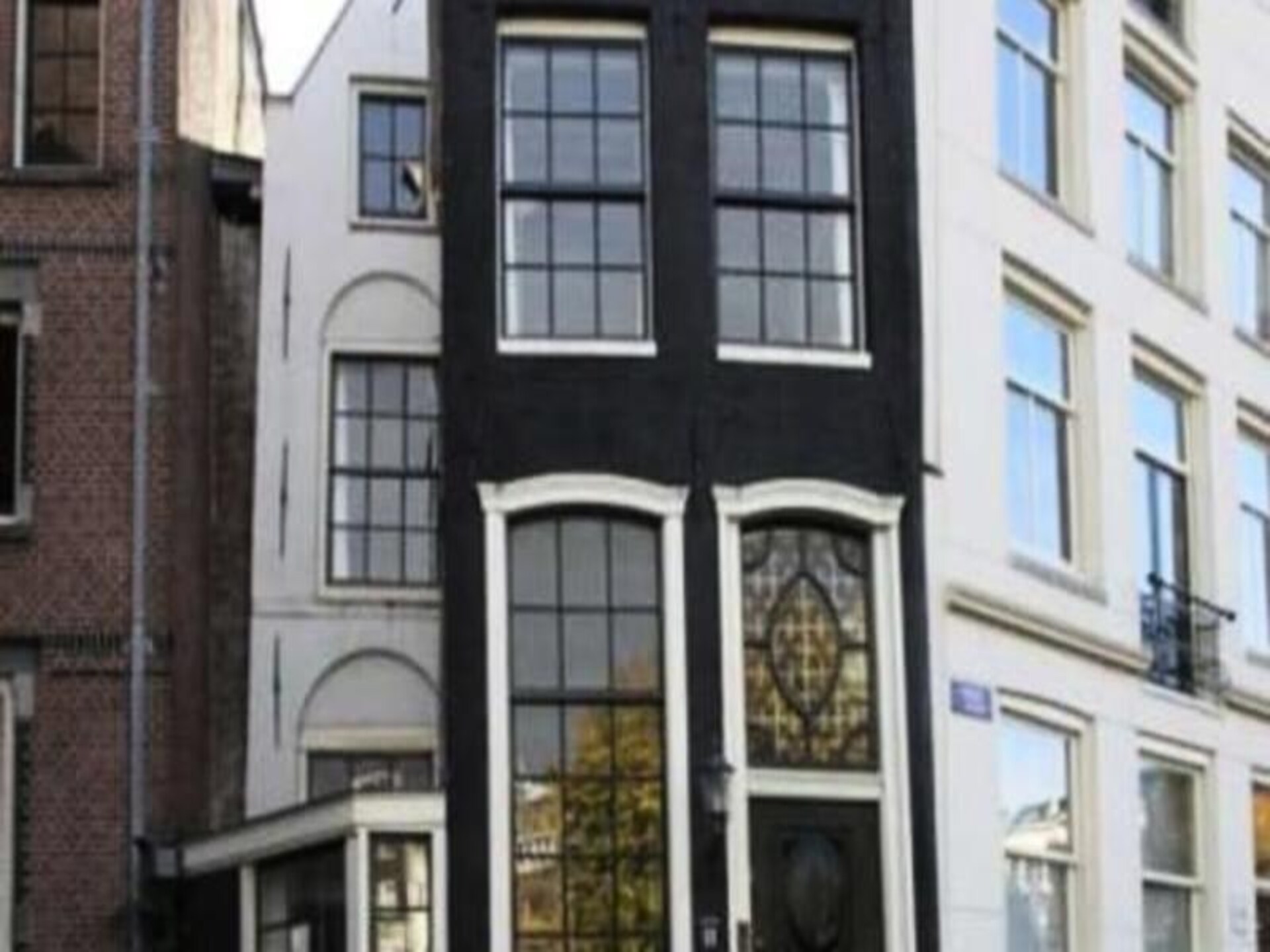 Historisch grachtenpand aan de Singel: stijlvolle 50m² kamer uit 1608 - foto 27