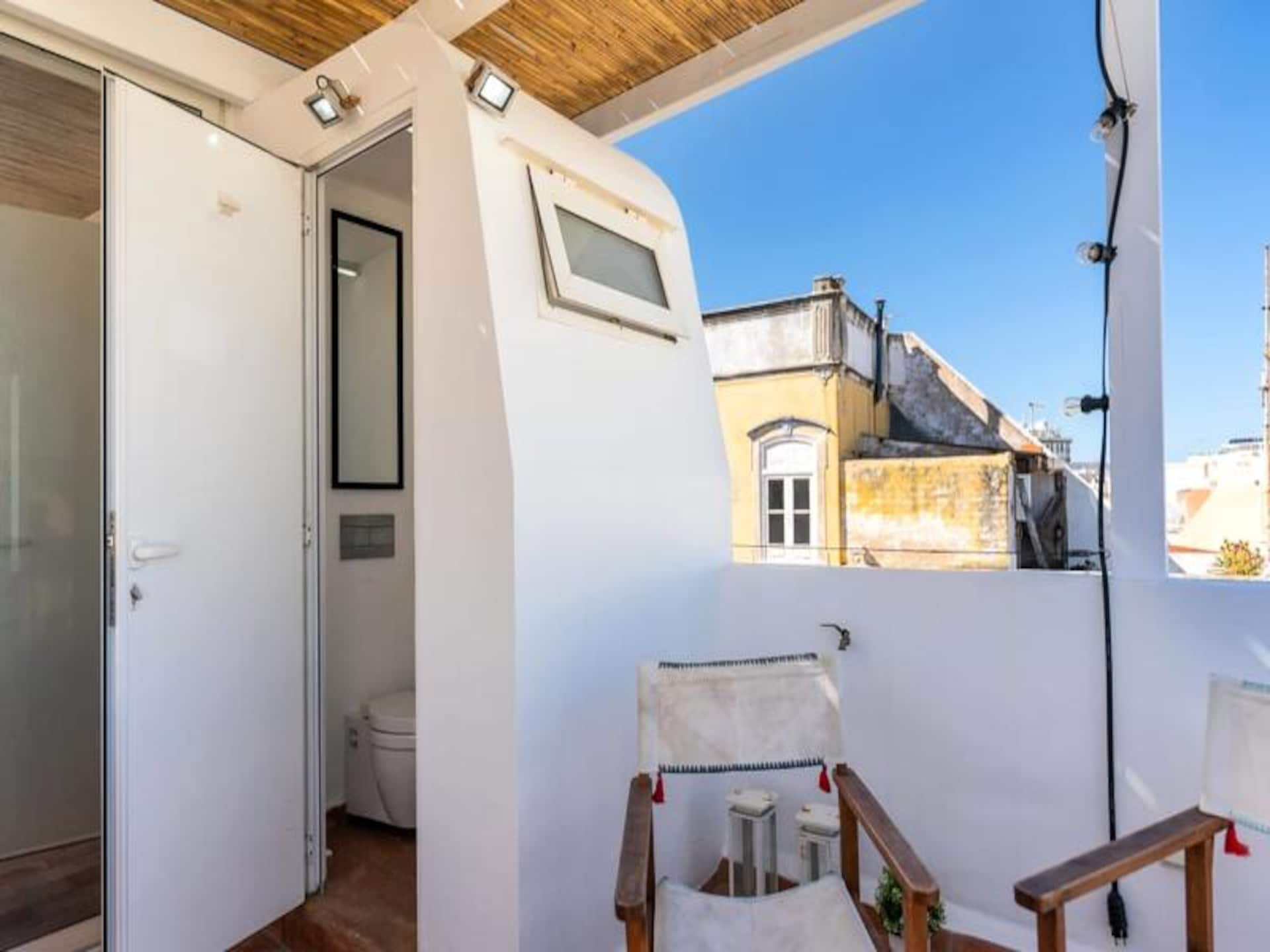 Historisch appartement in Olhão met panoramisch dakterras en uitzicht op zee - foto 36